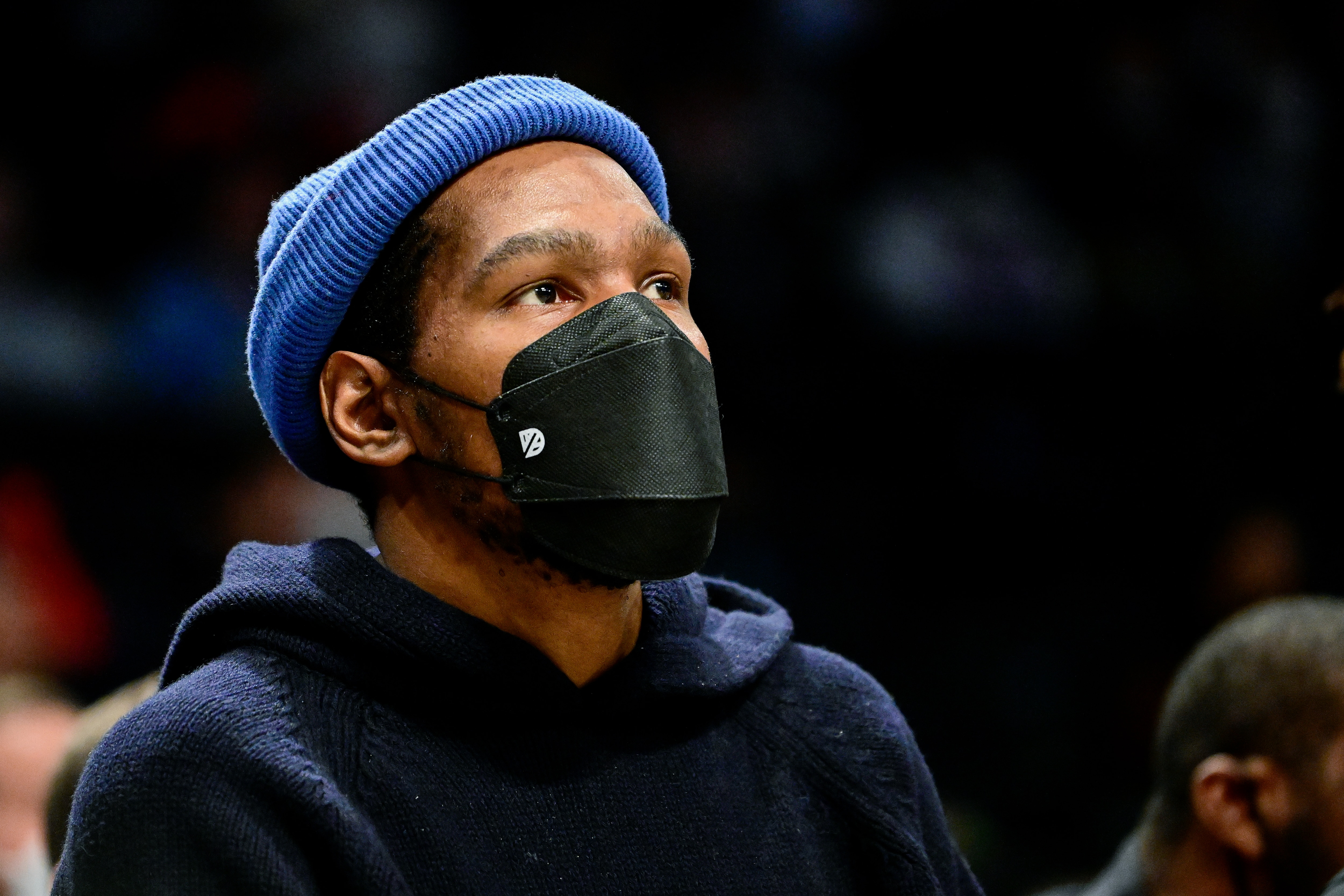 NEW YORK, NEW YORK - FEBRUARY 14:  Kevin Durant #7 of the Brooklyn Nets looks on from the bench against the Sacramento Kings at Barclays Center on February 14, 2022 in New York City. NOTE TO USER: User expressly acknowledges and agrees that, by downloading and or using this photograph, User is consenting to the terms and conditions of the Getty Images License Agreement.  (Photo by Steven Ryan/Getty Images)