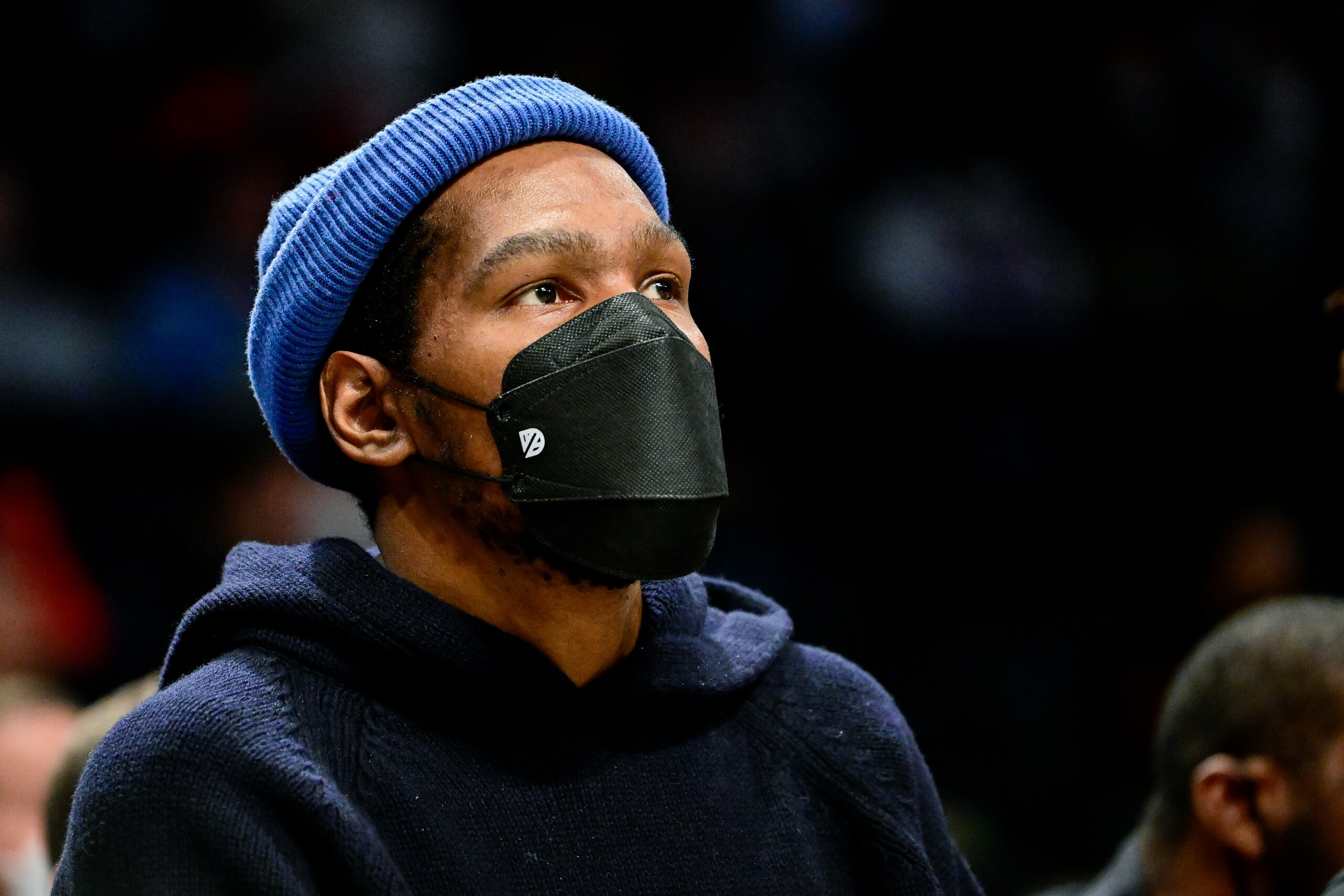 NEW YORK, NEW YORK - FEBRUARY 14:  Kevin Durant #7 of the Brooklyn Nets looks on from the bench against the Sacramento Kings at Barclays Center on February 14, 2022 in New York City. NOTE TO USER: User expressly acknowledges and agrees that, by downloading and or using this photograph, User is consenting to the terms and conditions of the Getty Images License Agreement.  (Photo by Steven Ryan/Getty Images)