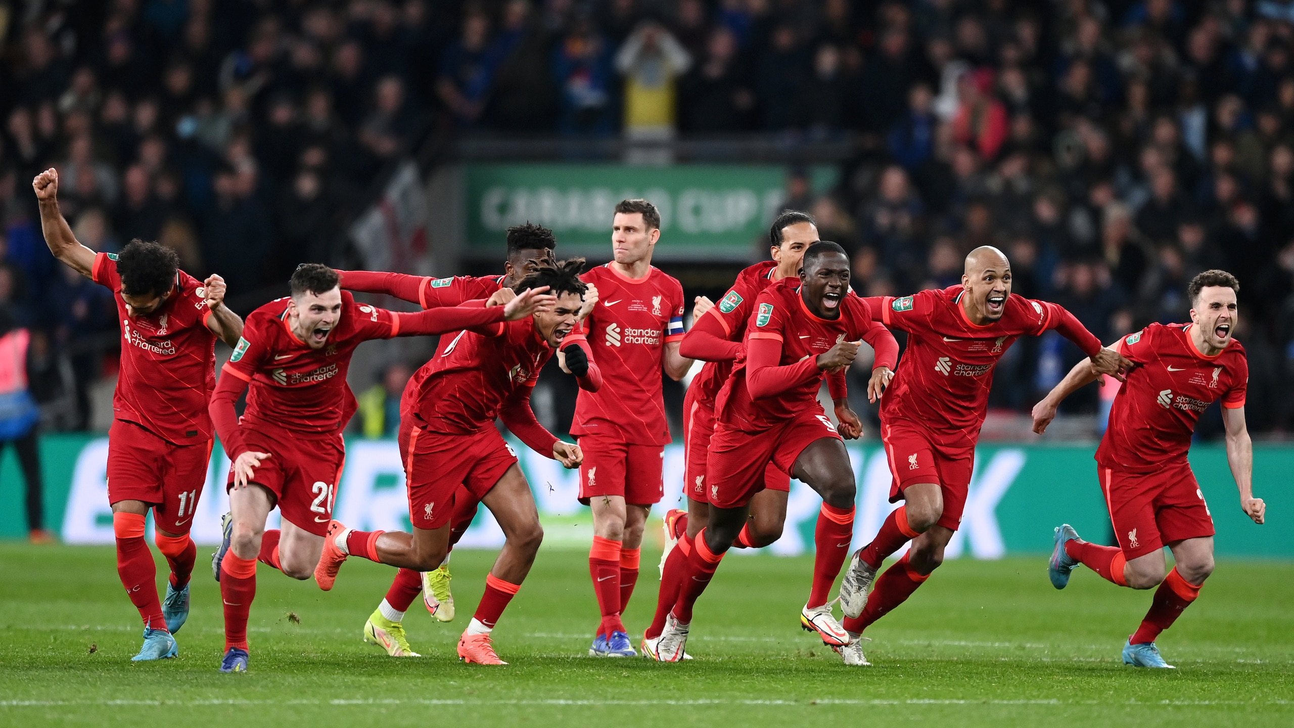 LONDON, ENGLAND - FEBRUARY 27: Liverpool players celebrate after victory in the penalty shoot out during the Carabao Cup Final match between Chelsea and Liverpool at Wembley Stadium on February 27, 2022 in London, England. (Photo by Shaun Botterill/Getty Images)