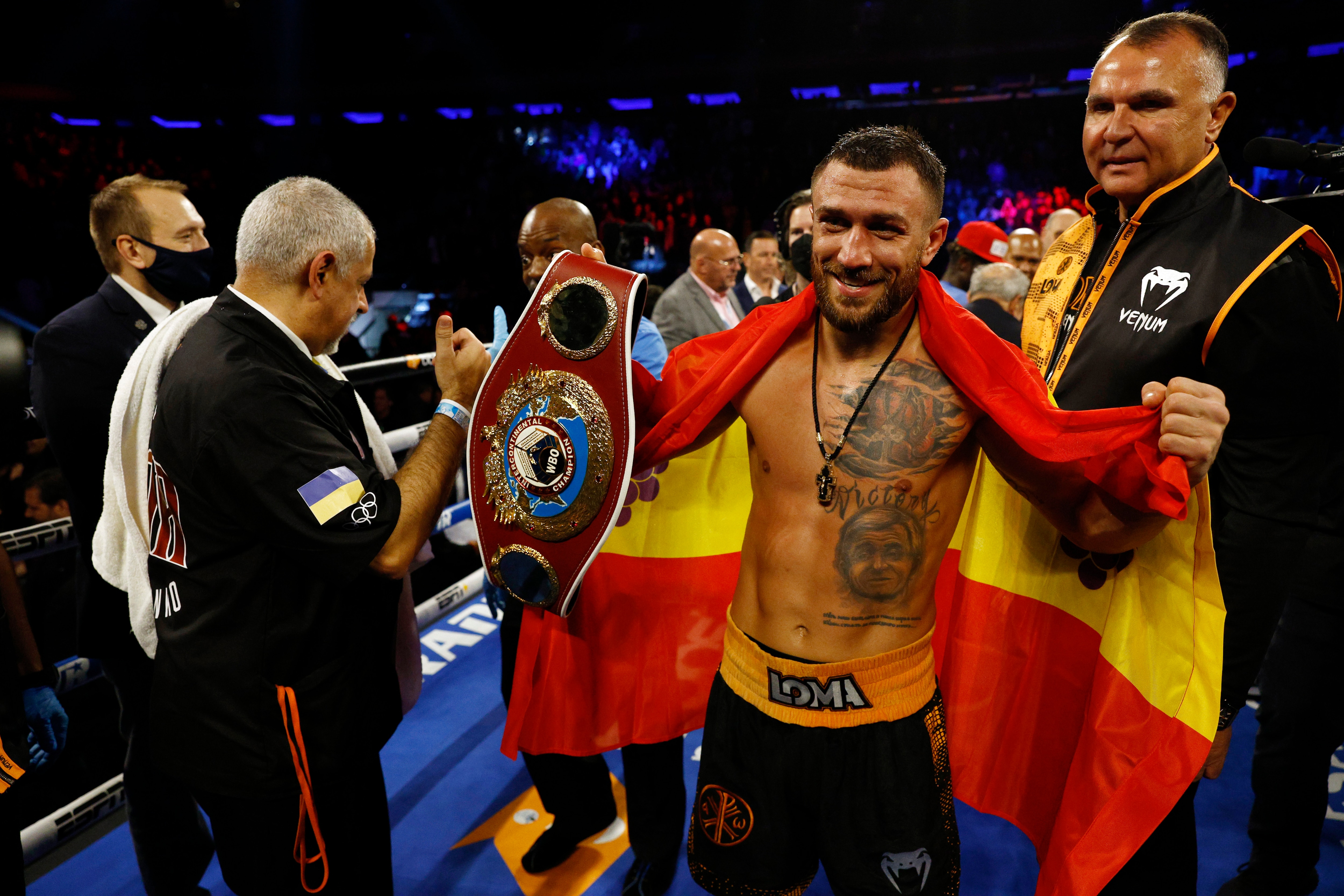 NEW YORK, NEW YORK - DECEMBER 11: Vasiliy Lomachenko (black trunks) reacts after his win over Richard Commey during their WBO Intercontinental Lightweight Title fight at Madison Square Garden on December 11, 2021 in New York, New York. (Photo by Sarah Stier/Getty Images)