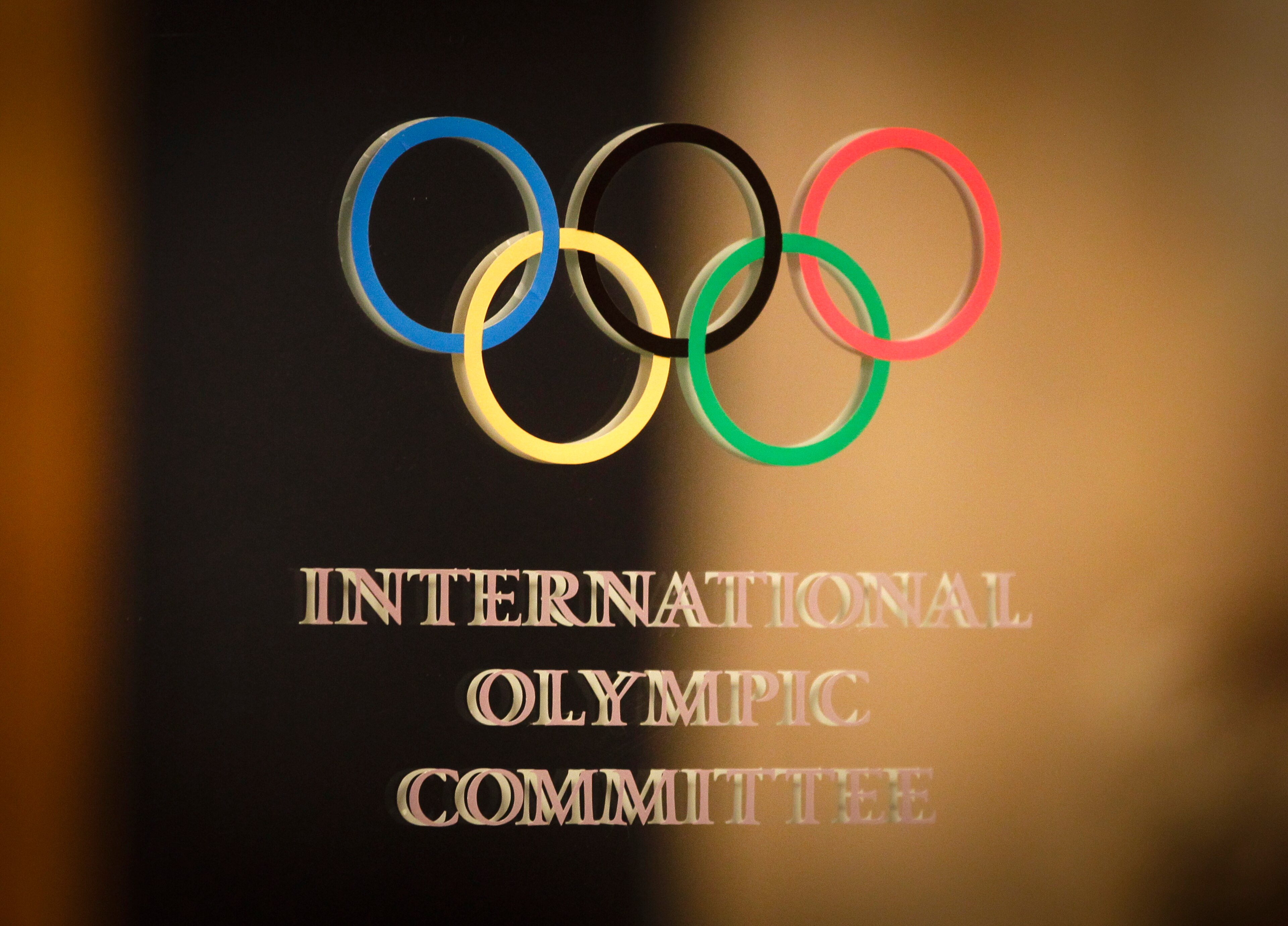 The International Olympic Committee (IOC) logo is seen on the door at a meeting of the IOC Executive Board at a hotel in London, prior to the 2012 Summer Olympics, Saturday, July 21, 2012. (AP Photo/Ben Curtis) The International Olympic Committee (IOC) logo is seen on the door at a meeting of the IOC Executive Board at a hotel in London, prior to the 2012 Summer Olympics, Saturday, July 21, 2012. (AP Photo/Ben Curtis)