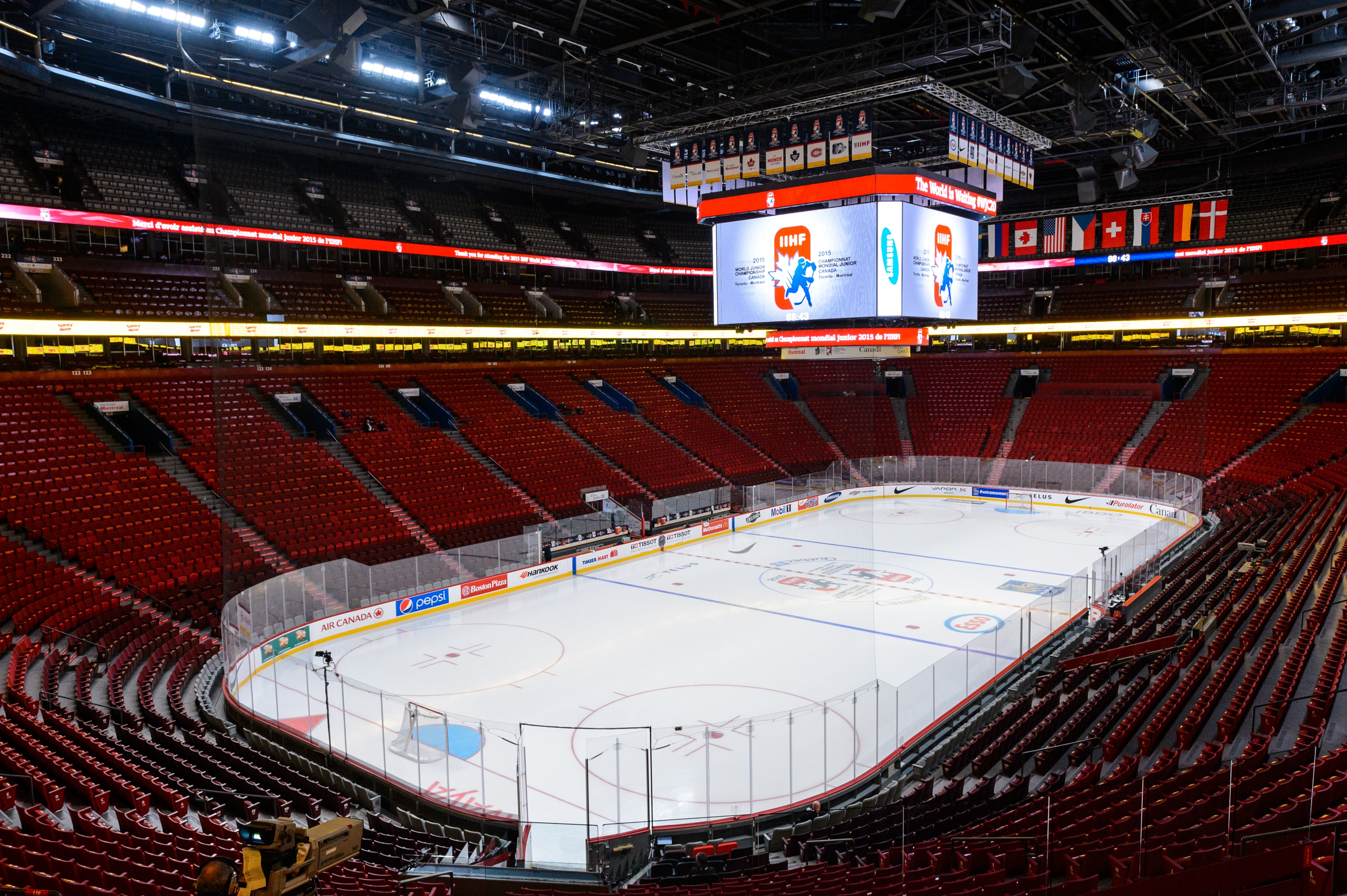 MONTREAL, QC - DECEMBER 28:  An empty Bell Centre with the IIHF logo displayed on the screen prior to the 2015 IIHF World Junior Hockey Championship game between Team Germany and Team United States at the Bell Centre on December 28, 2014 in Montreal, Quebec, Canada.  Team United States defeated Team Germany 6-0.  (Photo by Minas Panagiotakis/Getty Images)