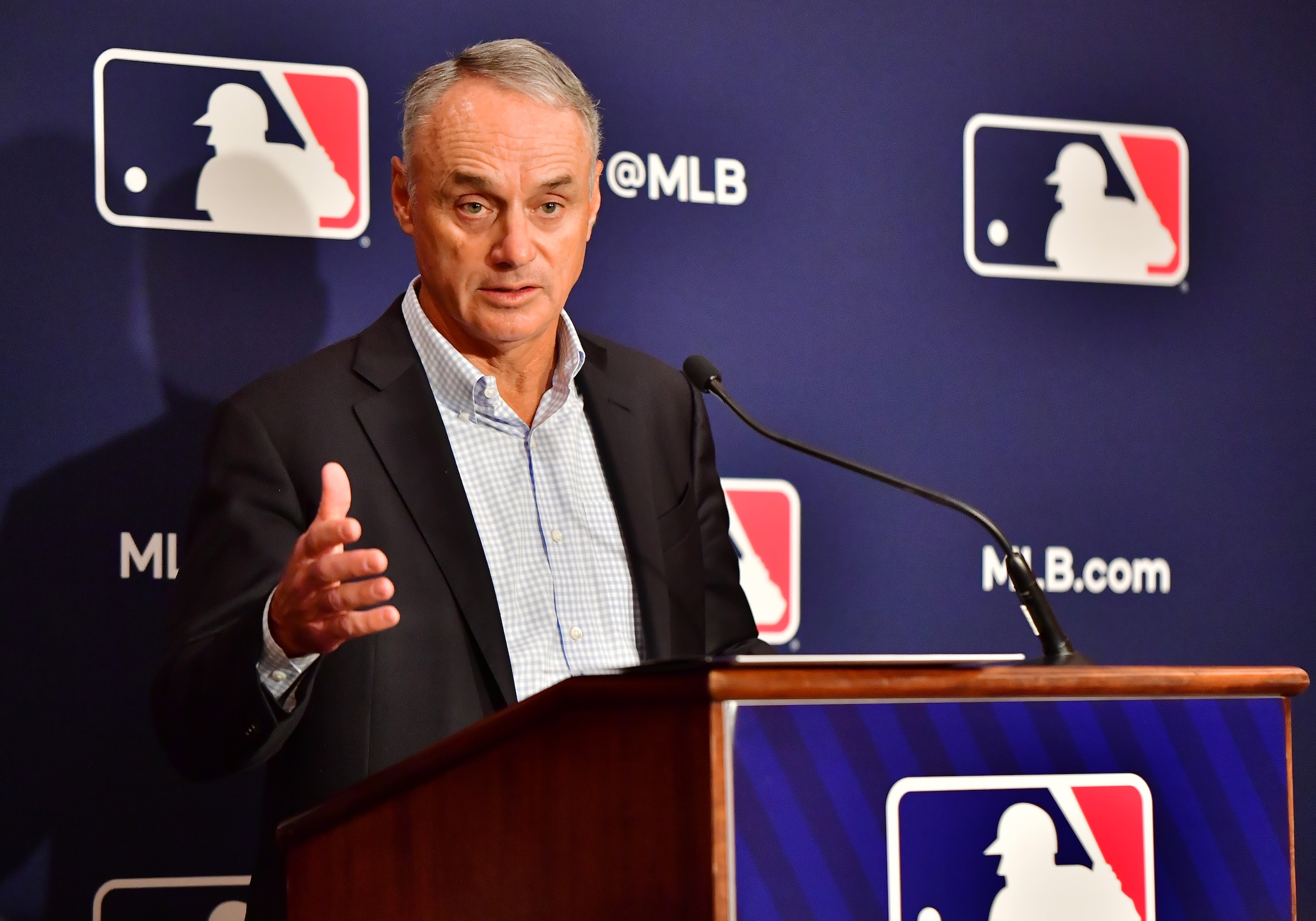 ORLANDO, FLORIDA - FEBRUARY 10: Major League Baseball Commissioner Rob Manfred answers questions during an MLB owner's meeting at the Waldorf Astoria on February 10, 2022 in Orlando, Florida. Manfred addressed the ongoing lockout of players, which owners put in place after the league's collective bargaining agreement ended on December 1, 2021. (Photo by Julio Aguilar/Getty Images)
