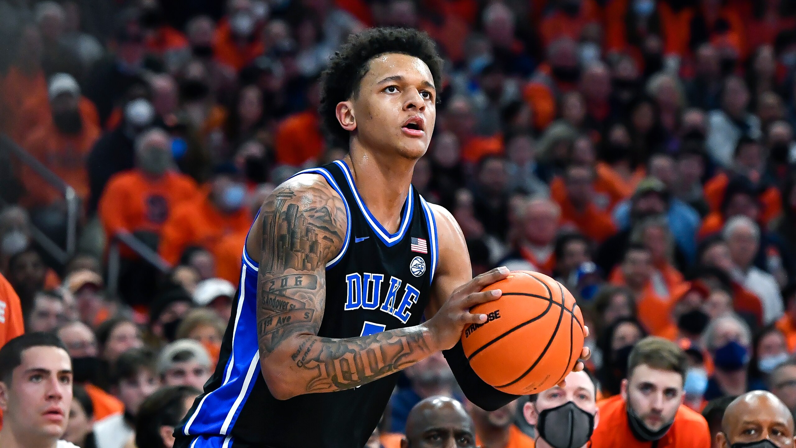 Duke forward Paolo Banchero (5) prepares to shoot during the first half of an NCAA college basketball game against Syracuse in Syracuse, N.Y., Saturday, Feb. 26, 2022. (AP Photo/Adrian Kraus)