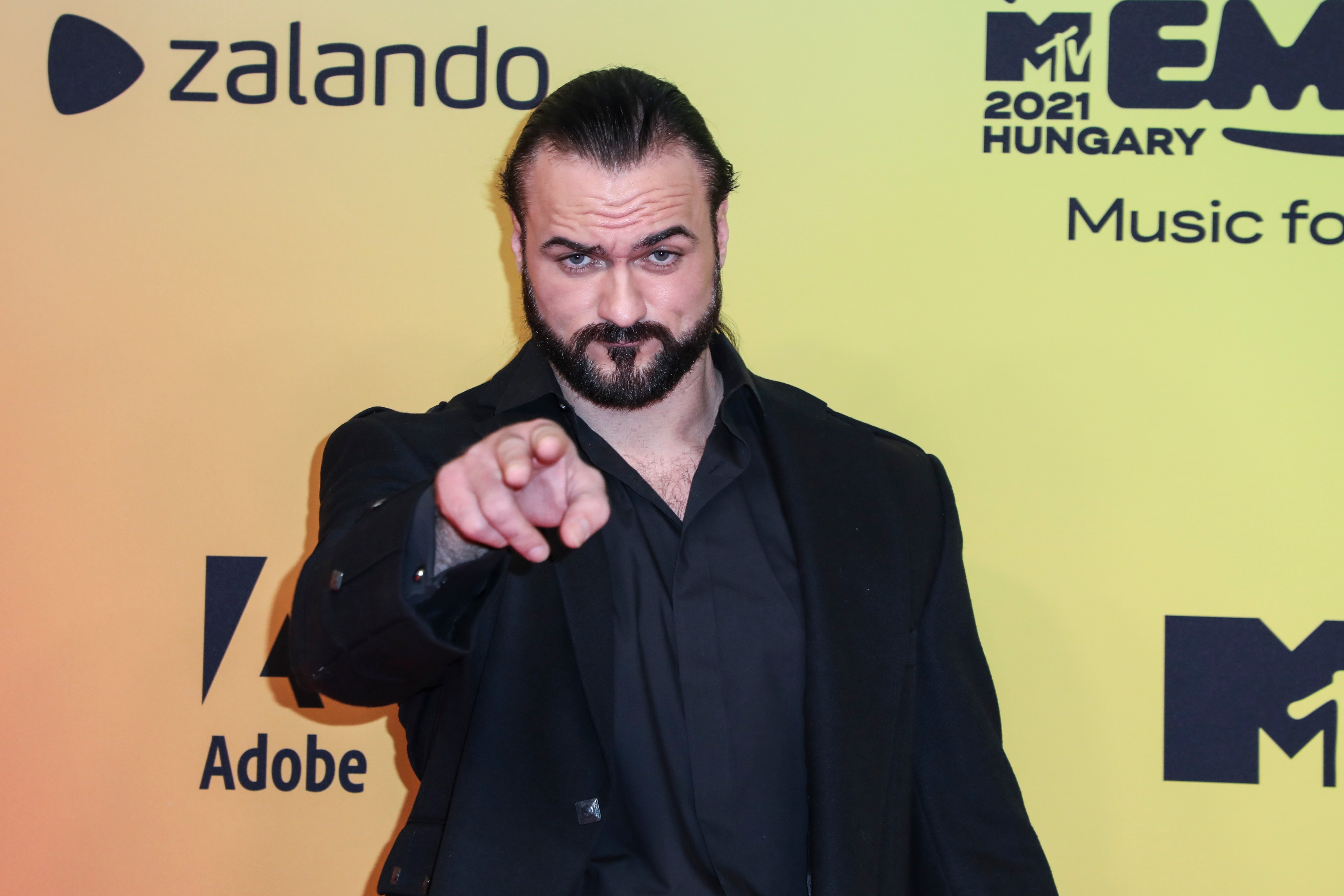 Drew McIntyre poses for photographers upon arrival at the European MTV Awards in Budapest, Hungary, Sunday, Nov. 14, 2021. (Photo by Vianney Le Caer/Invision/AP)