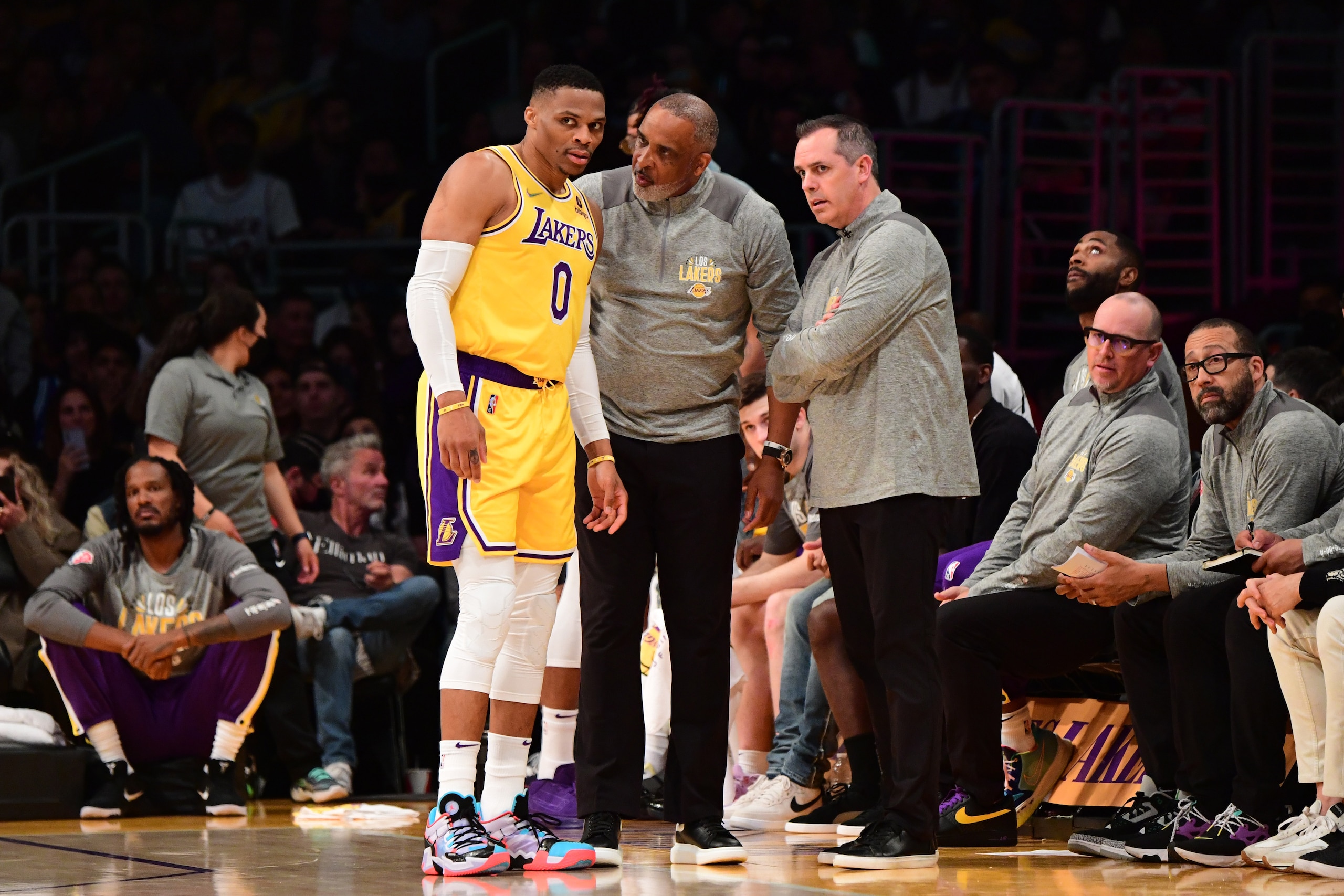 LOS ANGELES, CA - MARCH 1: Russell Westbrook #0 of the Los Angeles Lakers talks with Head Coach Frank Vogel of the Los Angeles Lakers and Assistant Coach Phil Handy during the game against the Dallas Mavericks on March 1, 2022 at Crypto.Com Arena in Los Angeles, California. NOTE TO USER: User expressly acknowledges and agrees that, by downloading and/or using this Photograph, user is consenting to the terms and conditions of the Getty Images License Agreement. Mandatory Copyright Notice: Copyright 2022 NBAE (Photo by Adam Pantozzi/NBAE via Getty Images) LOS ANGELES, CA - MARCH 1: Russell Westbrook #0 of the Los Angeles Lakers talks with Head Coach Frank Vogel of the Los Angeles Lakers and Assistant Coach Phil Handy during the game against the Dallas Mavericks on March 1, 2022 at Crypto.Com Arena in Los Angeles, California. NOTE TO USER: User expressly acknowledges and agrees that, by downloading and/or using this Photograph, user is consenting to the terms and conditions of the Getty Images License Agreement. Mandatory Copyright Notice: Copyright 2022 NBAE (Photo by Adam Pantozzi/NBAE via Getty Images)