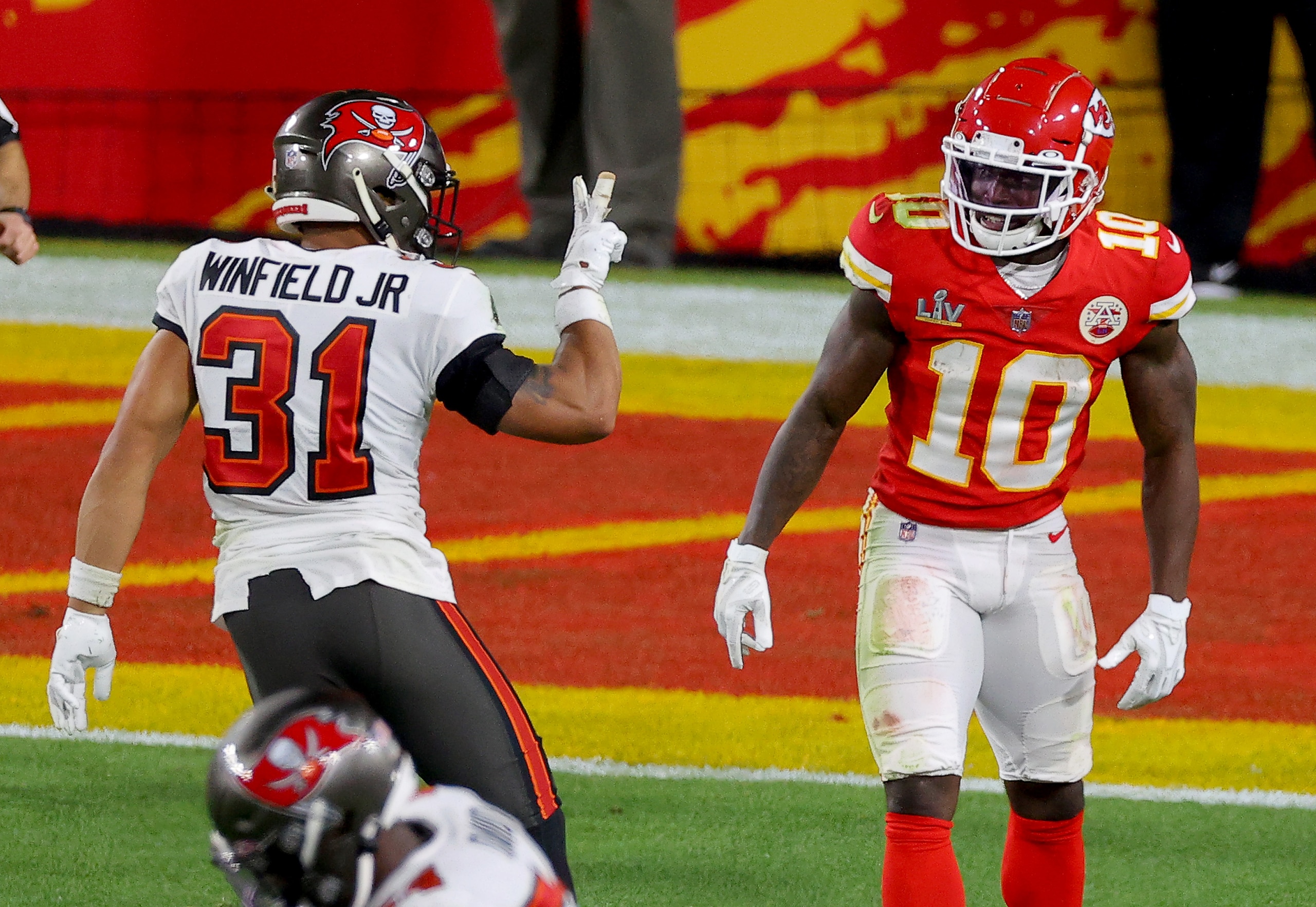 TAMPA, FLORIDA - FEBRUARY 07: Antoine Winfield Jr. #31 of the Tampa Bay Buccaneers taunts Tyreek Hill #10 of the Kansas City Chiefs during the fourth quarter in Super Bowl LV at Raymond James Stadium on February 07, 2021 in Tampa, Florida. (Photo by Kevin C. Cox/Getty Images)