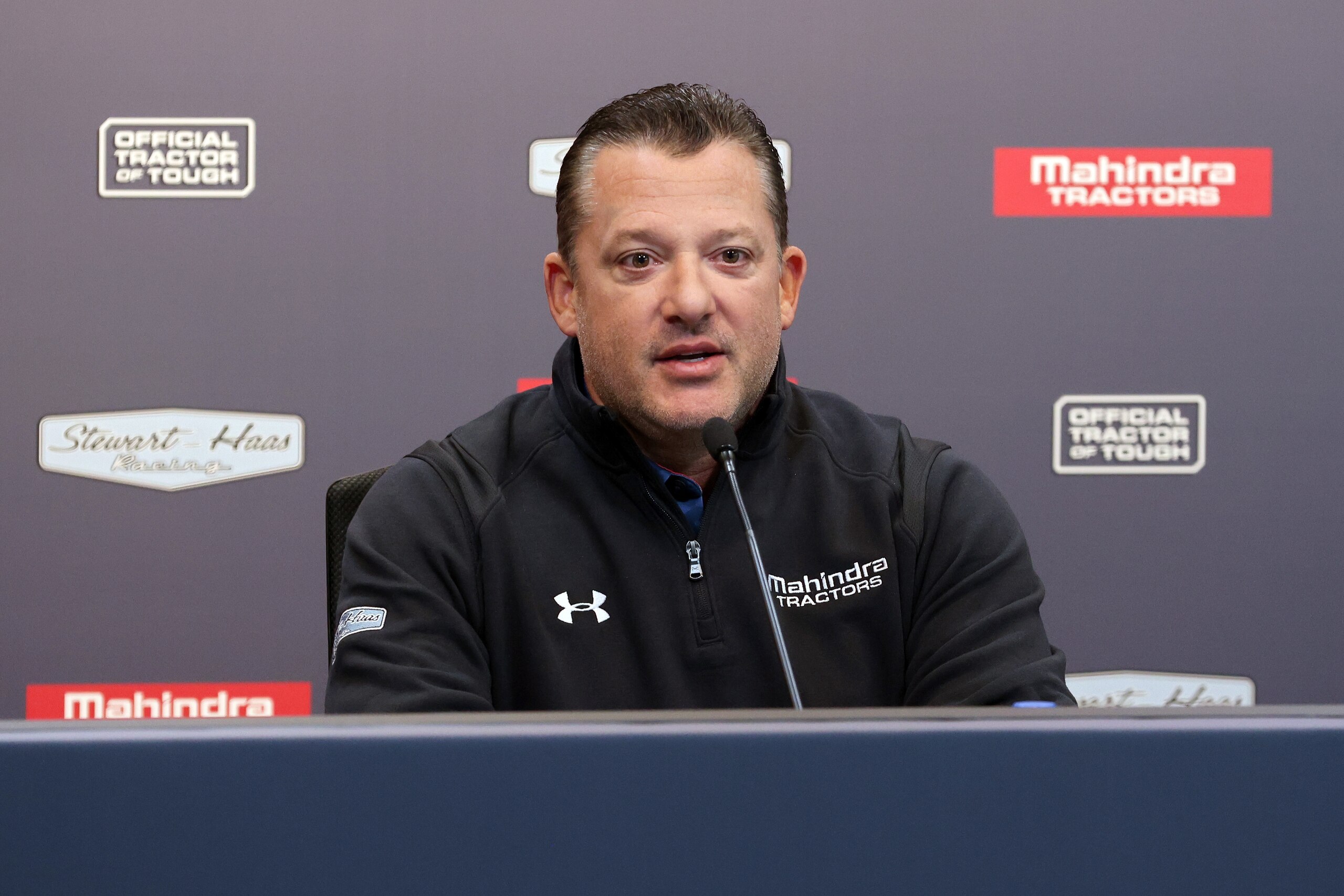 INDIANAPOLIS, INDIANA - DECEMBER 10: Tony Stewart speaks during a press event announcing a partnership between Stewart-Haas Racing and Mahindra Tractors at Indianapolis Motor Speedway on December 10, 2021 in Indianapolis, Indiana. (Photo by Dylan Buell/Getty Images)