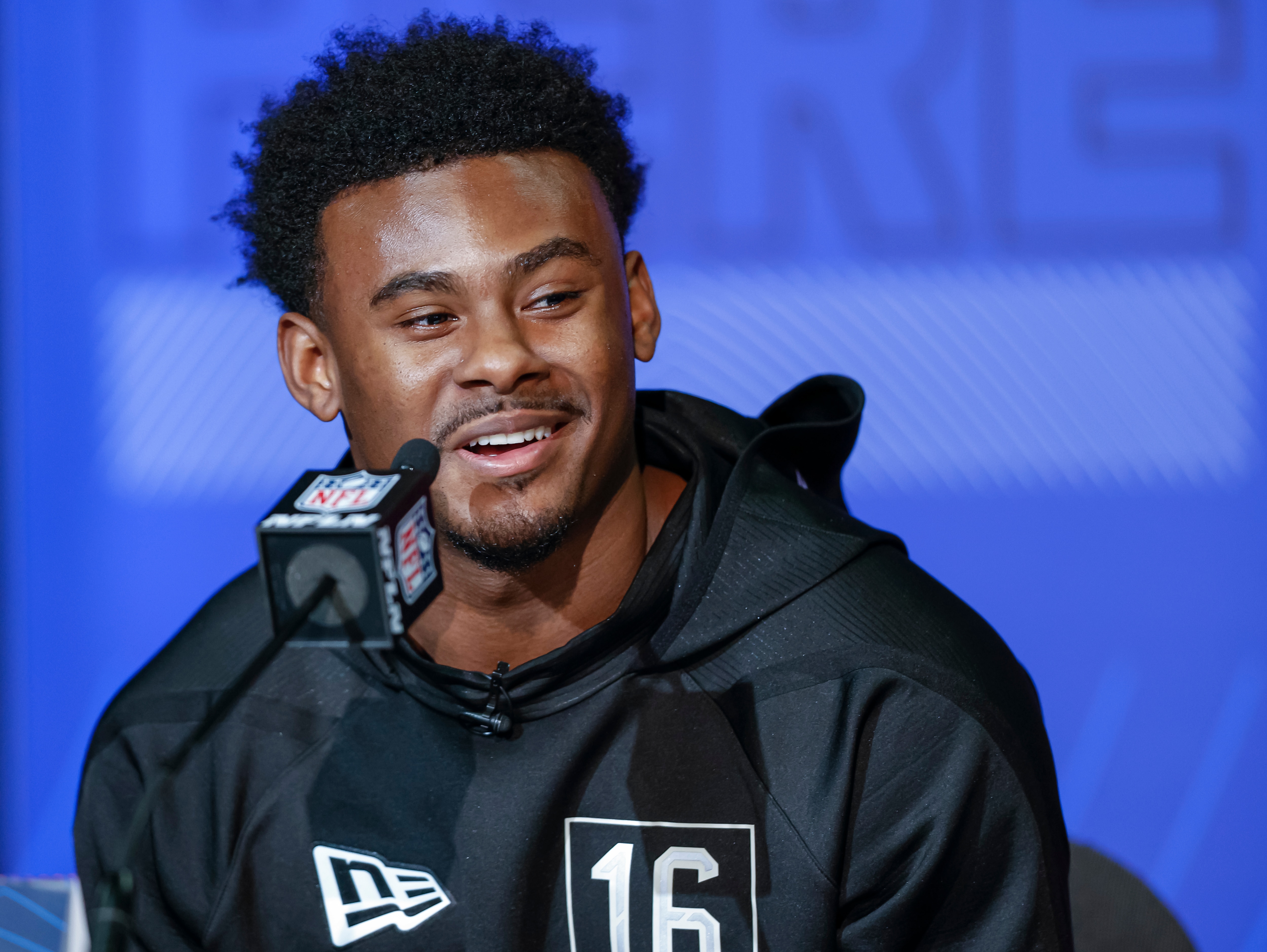 INDIANAPOLIS, IN - MAR 02: Malik Willis #QB16 of the Liberty Flames speaks to reporters during the NFL Draft Combine at the Indiana Convention Center on March 2, 2022 in Indianapolis, Indiana. (Photo by Michael Hickey/Getty Images)
