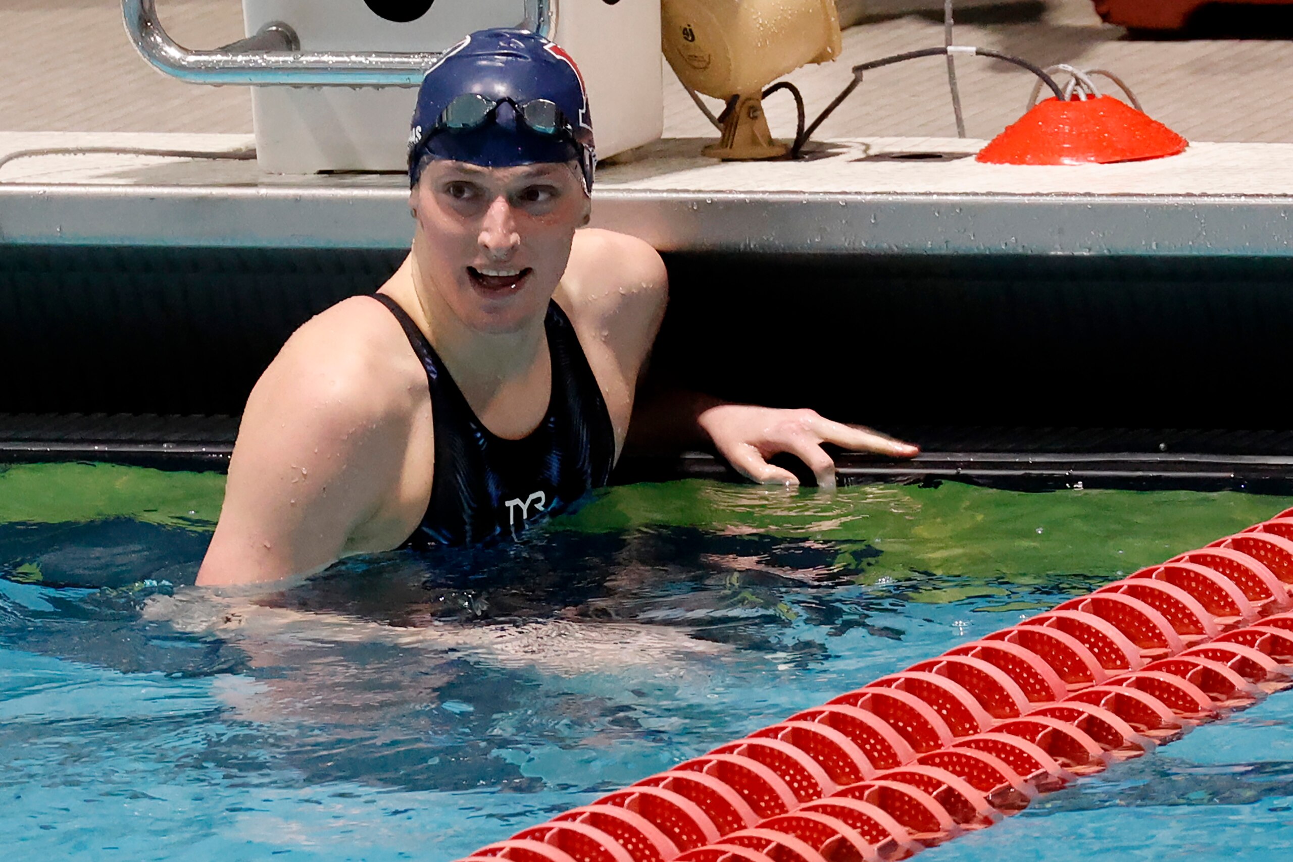 Pennsylvania's Lia Thomas smiles after winning the 100-yard freestyle final at the Ivy League Women's Swimming and Diving Championships at Harvard University, Saturday, Feb. 19, 2022, in Cambridge, Mass. Thomas, who is transitioning to female, is swimming for the Penn women's team. (AP Photo/Mary Schwalm)