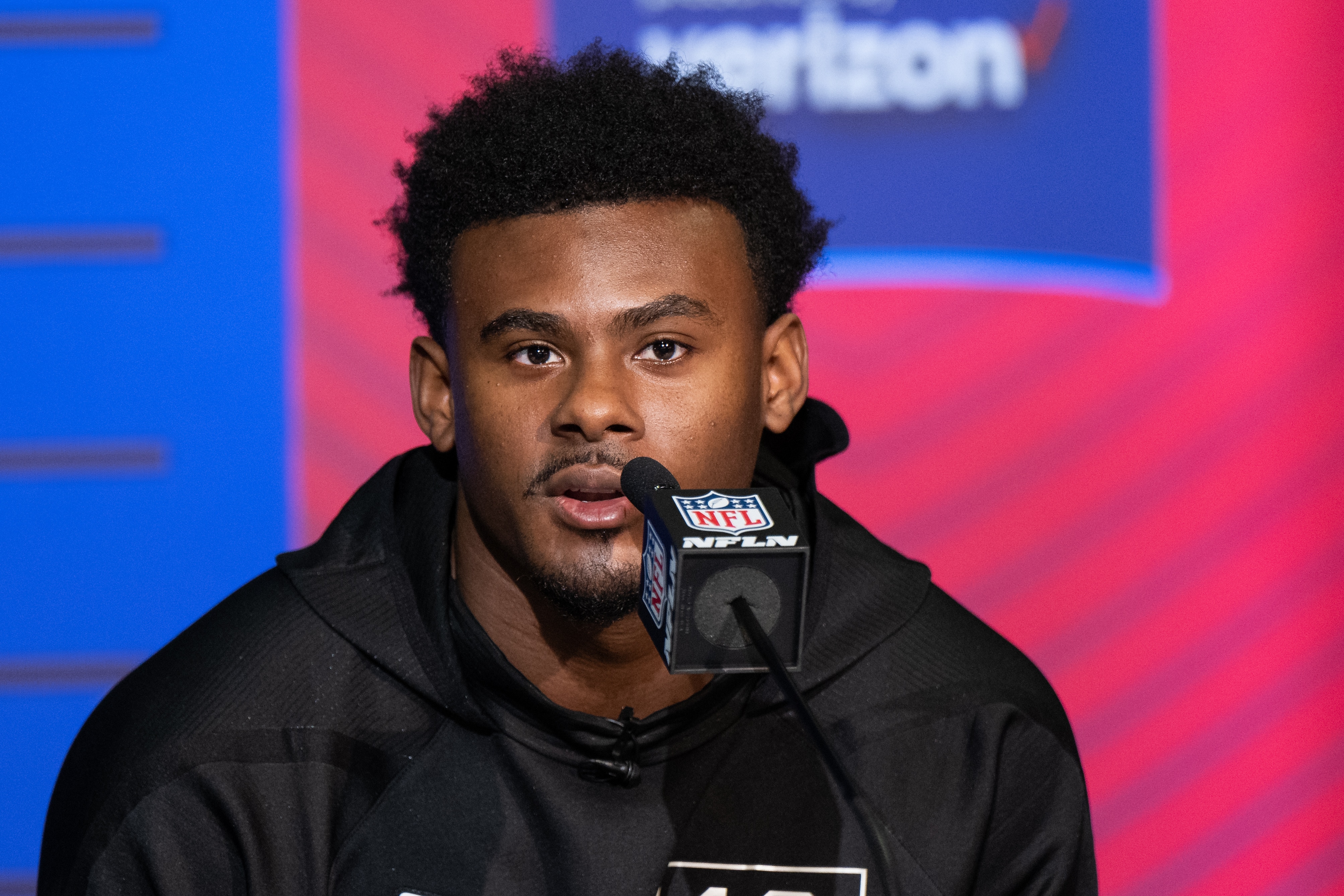 INDIANAPOLIS, IN - MARCH 02: Liberty quarterback Malik Willis answers questions from the media during the NFL Scouting Combine on March 2, 2022, at the Indiana Convention Center in Indianapolis, IN. (Photo by Zach Bolinger/Icon Sportswire via Getty Images)