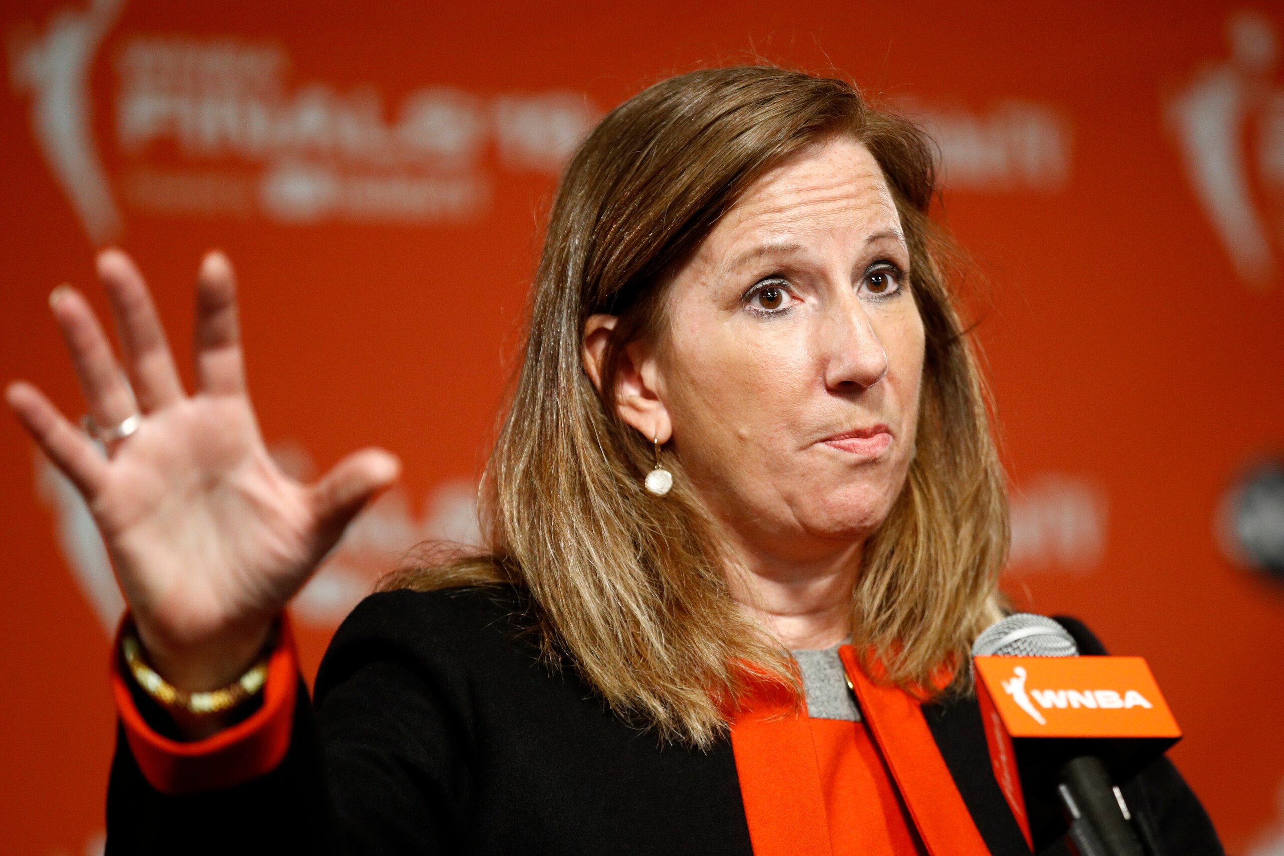 FILE - WNBA Commissioner Cathy Engelbert speaks at a news conference before Game 1 of basketball's WNBA Finals, in a Sunday, Sept. 29, 2019 file photo, in Washington. Atlanta Dream co-owner Kelly Loeffler is not in favor of the WNBA's social justice plans and has sent a letter to Commissioner Cathy Engelbert objecting to the league’s initiatives to honor the Black Lives Matter movement when the season begins in Florida. Loeffler is a U.S. Republican senator running for re-election in Georgia.(AP Photo/Patrick Semansky) FILE - WNBA Commissioner Cathy Engelbert speaks at a news conference before Game 1 of basketball's WNBA Finals, in a Sunday, Sept. 29, 2019 file photo, in Washington. Atlanta Dream co-owner Kelly Loeffler is not in favor of the WNBA's social justice plans and has sent a letter to Commissioner Cathy Engelbert objecting to the league’s initiatives to honor the Black Lives Matter movement when the season begins in Florida. Loeffler is a U.S. Republican senator running for re-election in Georgia.(AP Photo/Patrick Semansky)
