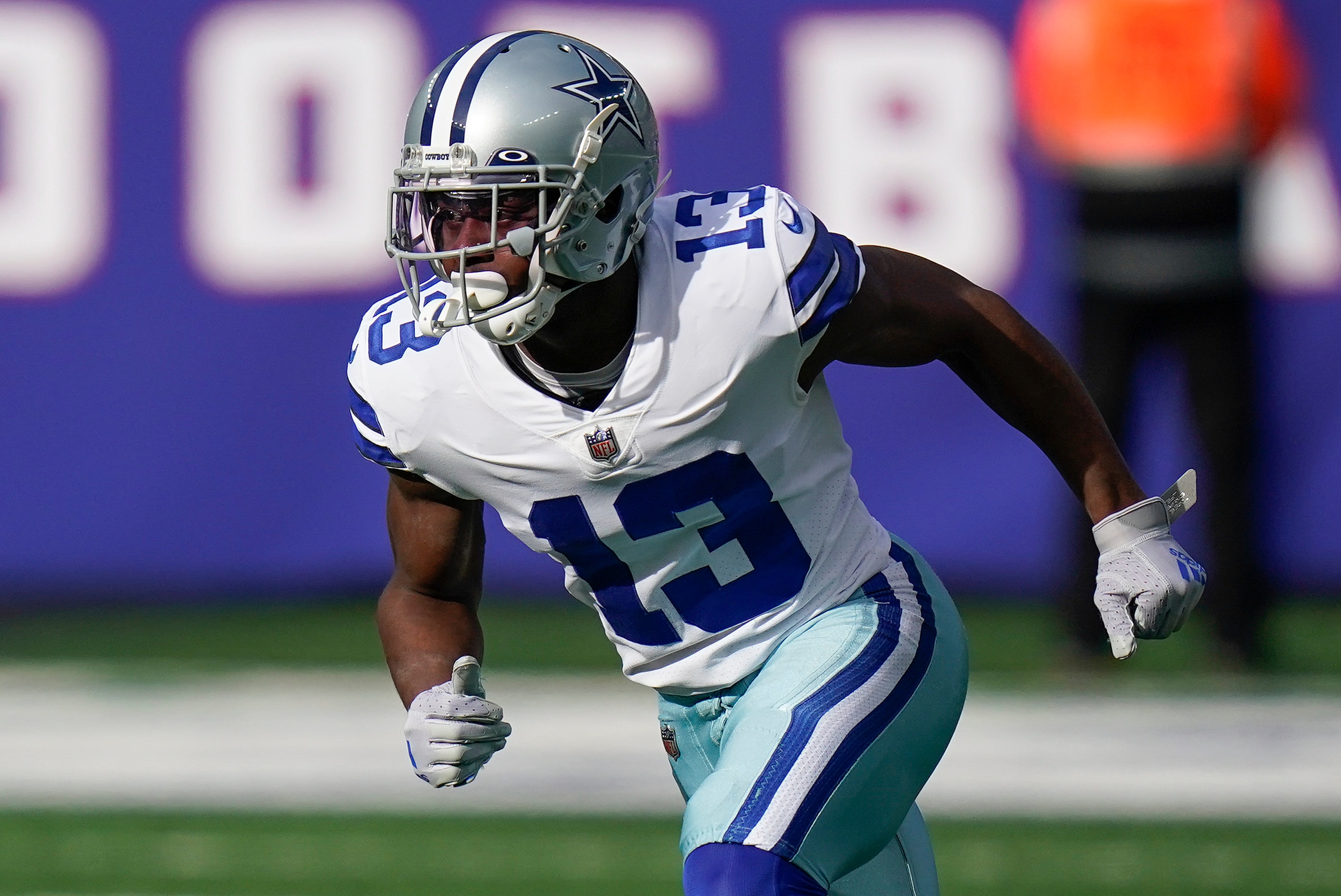 Dallas Cowboys wide receiver Michael Gallup (13) during the first quarter of an NFL football game against the New York Giants, Sunday, Dec. 19, 2021, in East Rutherford, N.J. (AP Photo/Seth Wenig) Dallas Cowboys wide receiver Michael Gallup (13) during the first quarter of an NFL football game against the New York Giants, Sunday, Dec. 19, 2021, in East Rutherford, N.J. (AP Photo/Seth Wenig)