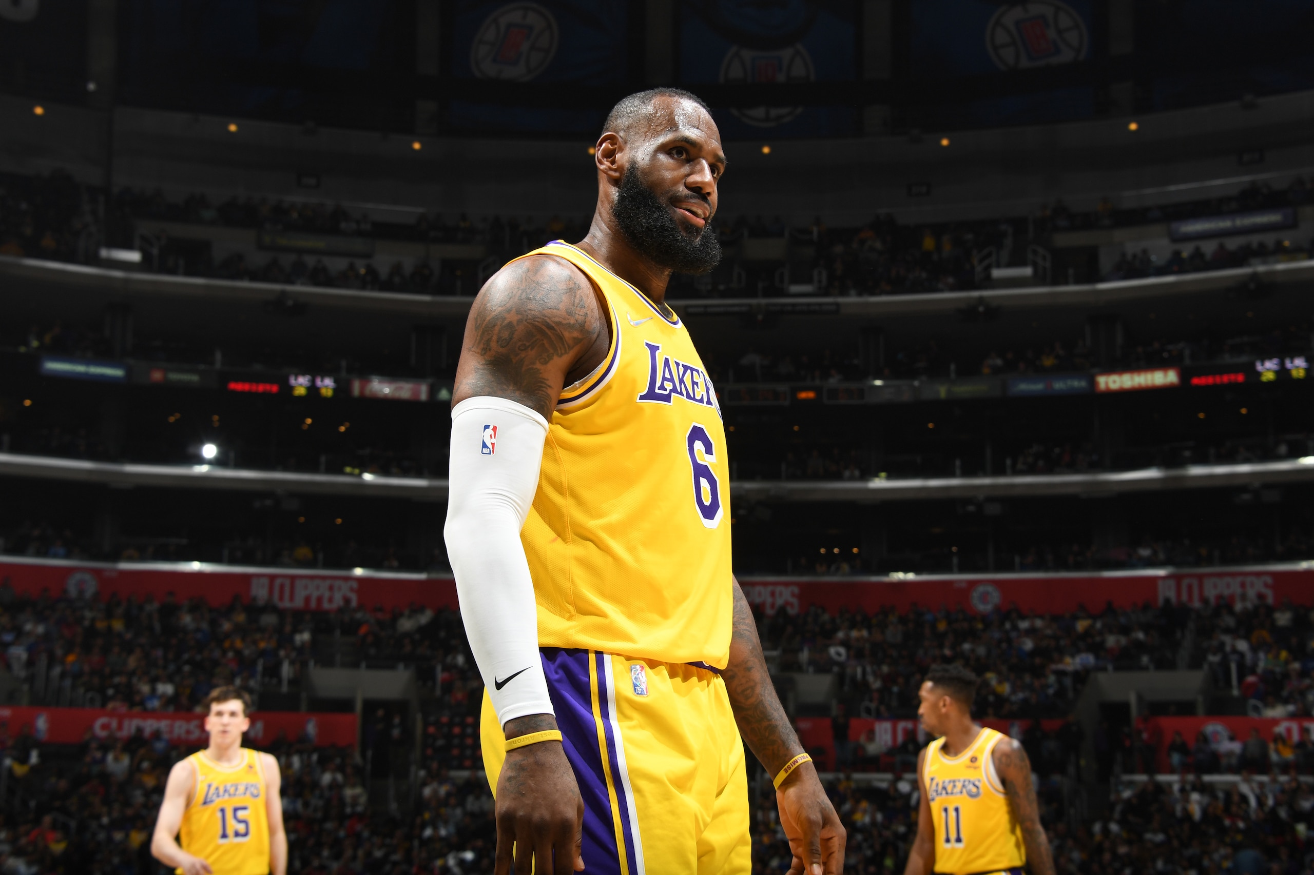 LOS ANGELES, CA - MARCH 3: LeBron James #6 of the Los Angeles Lakers smiles during the game against the LA Clippers on March 3, 2022 at Crypto.Com Arena in Los Angeles, California. NOTE TO USER: User expressly acknowledges and agrees that, by downloading and/or using this Photograph, user is consenting to the terms and conditions of the Getty Images License Agreement. Mandatory Copyright Notice: Copyright 2022 NBAE (Photo by Andrew D. Bernstein/NBAE via Getty Images)