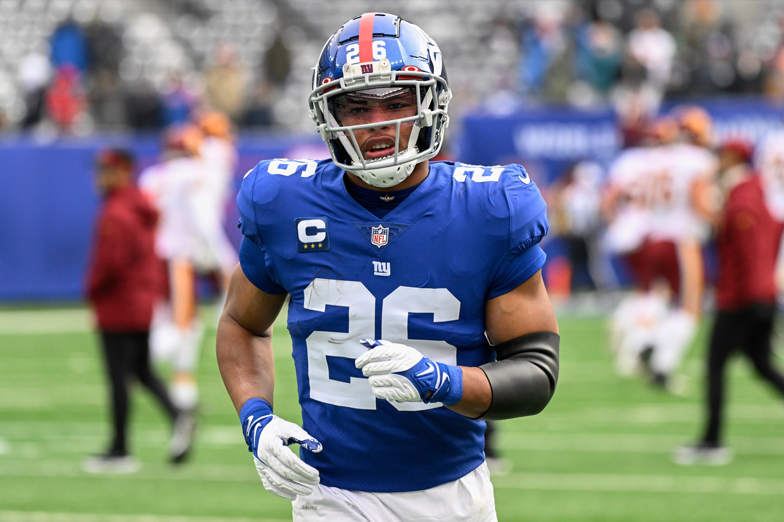 New York Giants running back Saquon Barkley (26) warms up before playing against the Washington Football Team in an NFL football game, Sunday, Jan. 9, 2022, in East Rutherford, N.J. (AP Photo/Bill Kostroun)