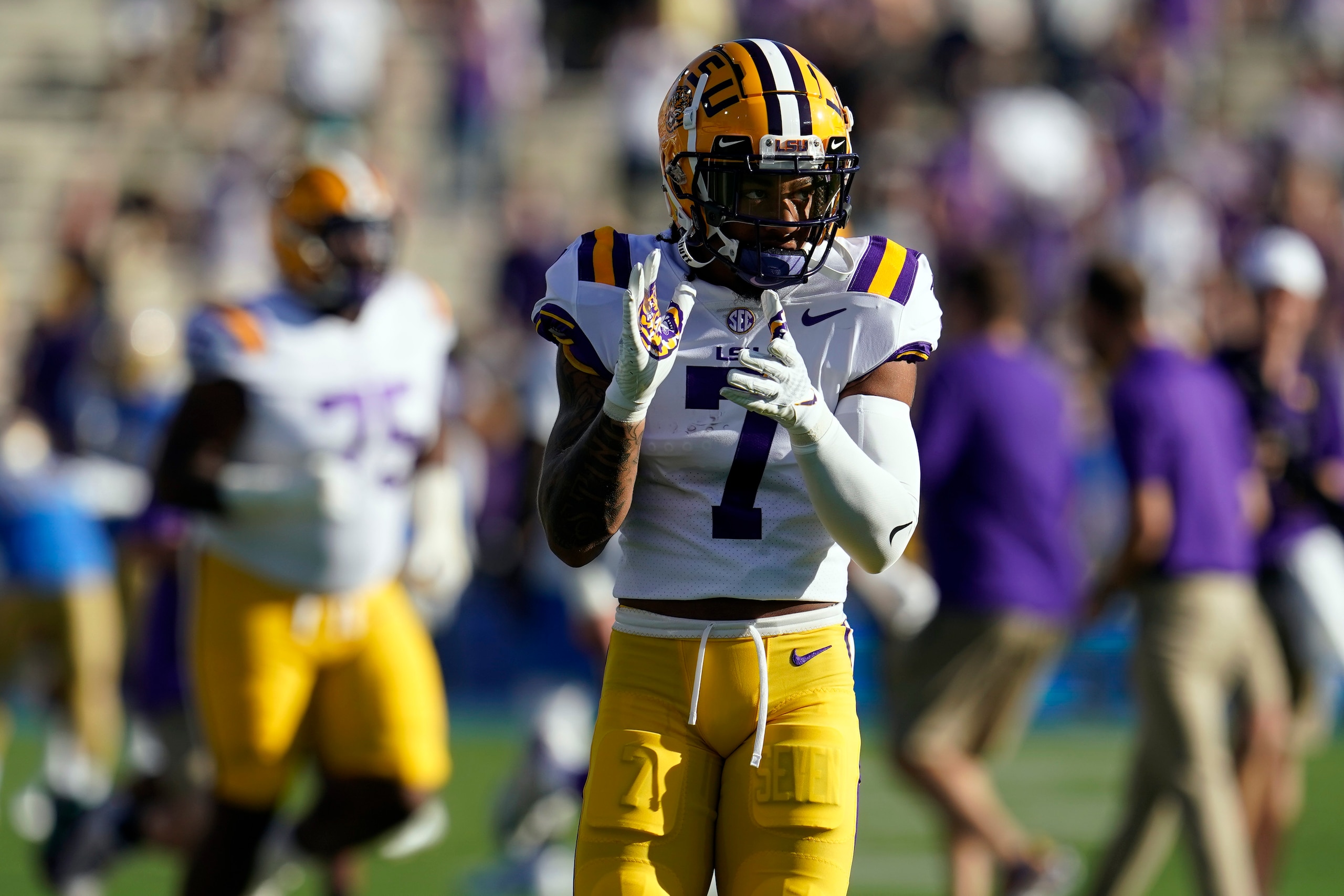 LSU cornerback Derek Stingley Jr. (7) warms up before an NCAA college football game against UCLA Saturday, Sept. 4, 2021, in Pasadena, Calif. (AP Photo/Marcio Jose Sanchez)