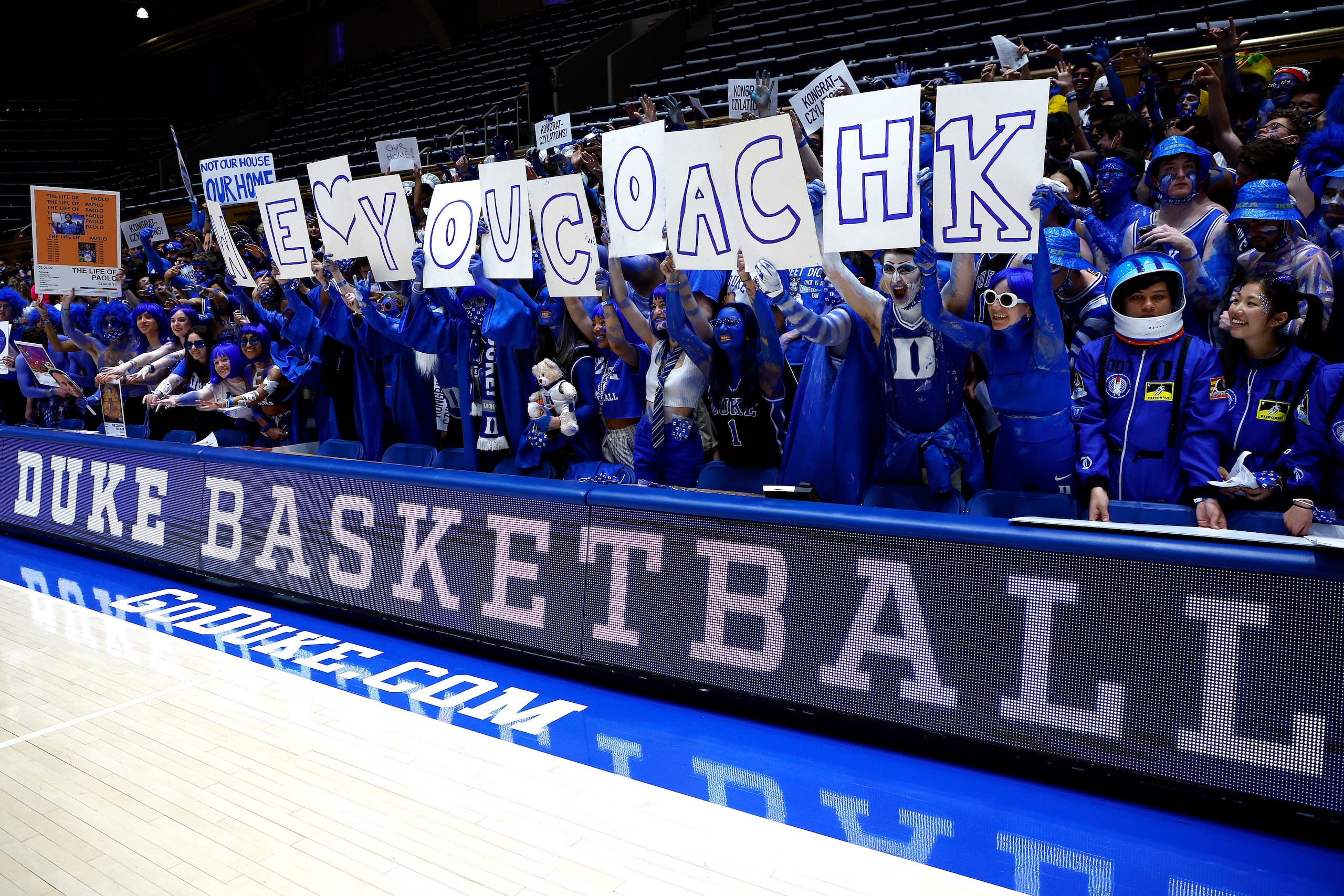 DURHAM, NORTH CAROLINA - MARCH 05: Fans hold up a sign for head coach Mike Krzyzewski of the Duke Blue Devils before he coaches his final home game at Cameron Indoor Stadium against the North Carolina Tar Heels on March 05, 2022 in Durham, North Carolina. (Photo by Jared C. Tilton/Getty Images)