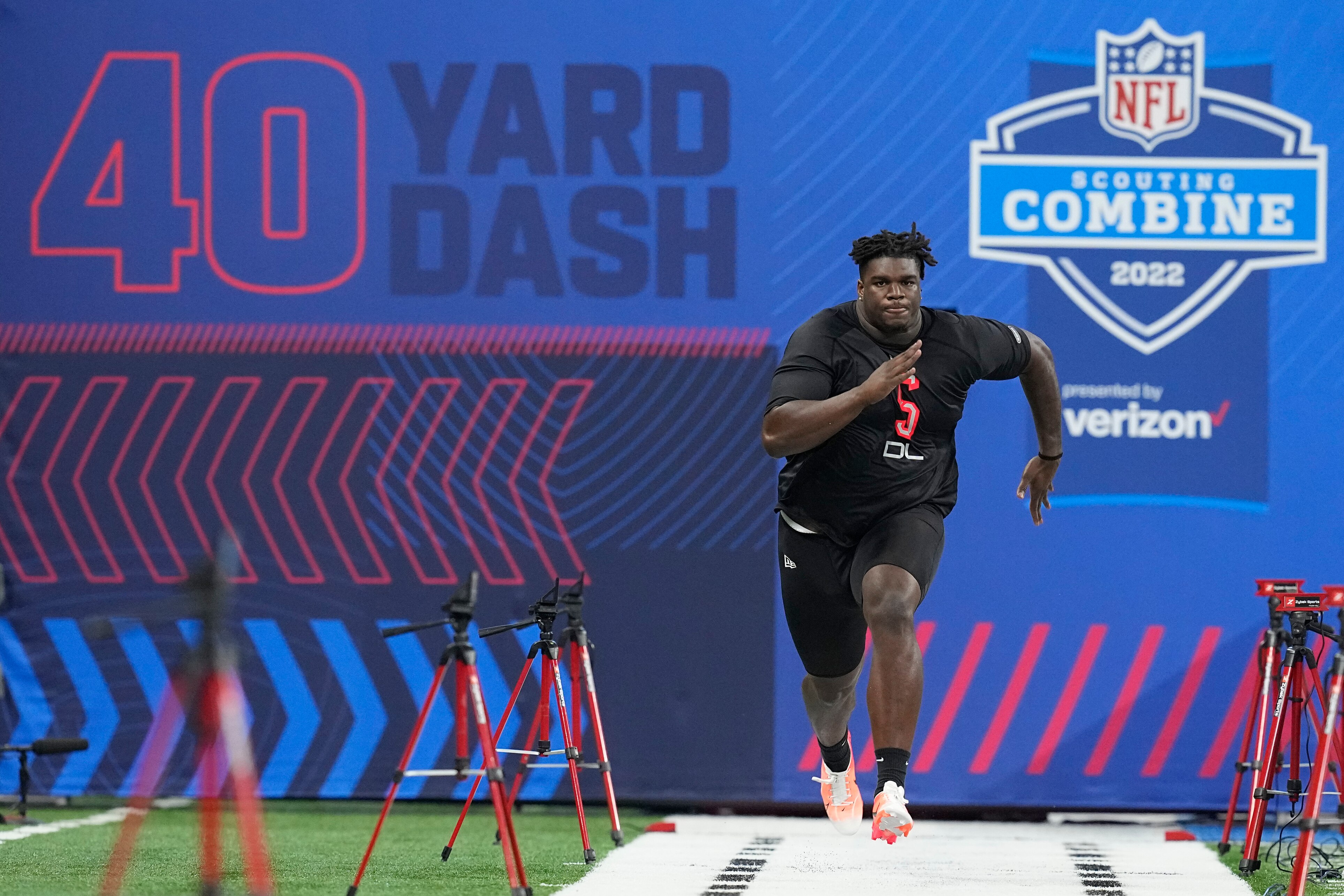Georgia defensive lineman Jordan Davis runs the 40-yard dash during the NFL football scouting combine, Saturday, March 5, 2022, in Indianapolis. (AP Photo/Darron Cummings)