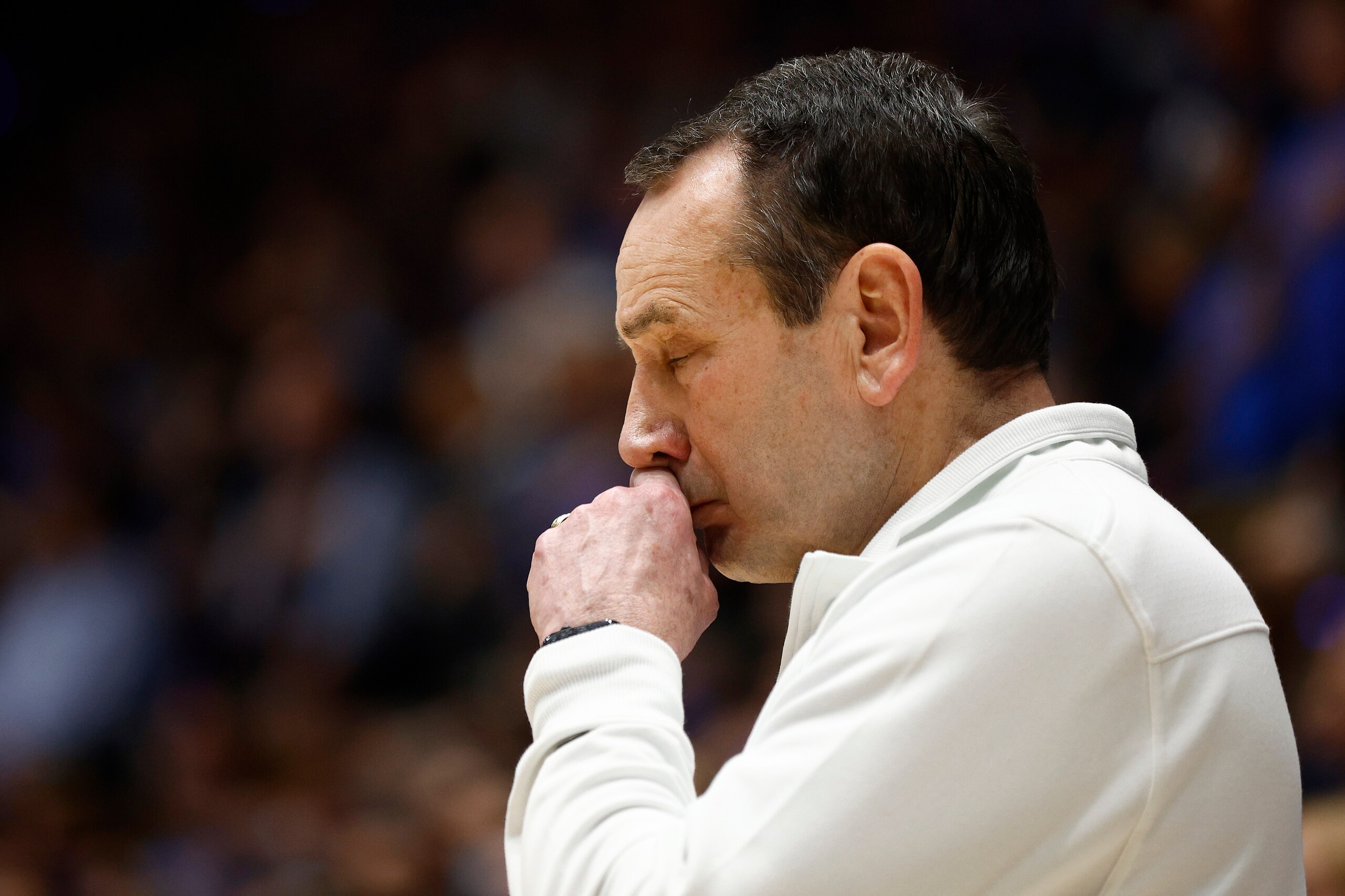 DURHAM, NORTH CAROLINA - MARCH 05: Head coach Mike Krzyzewski of the Duke Blue Devils looks on during the national anthem prior to a game against the North Carolina Tar Heels at Cameron Indoor Stadium on March 05, 2022 in Durham, North Carolina. (Photo by Jared C. Tilton/Getty Images) DURHAM, NORTH CAROLINA - MARCH 05: Head coach Mike Krzyzewski of the Duke Blue Devils looks on during the national anthem prior to a game against the North Carolina Tar Heels at Cameron Indoor Stadium on March 05, 2022 in Durham, North Carolina. (Photo by Jared C. Tilton/Getty Images)