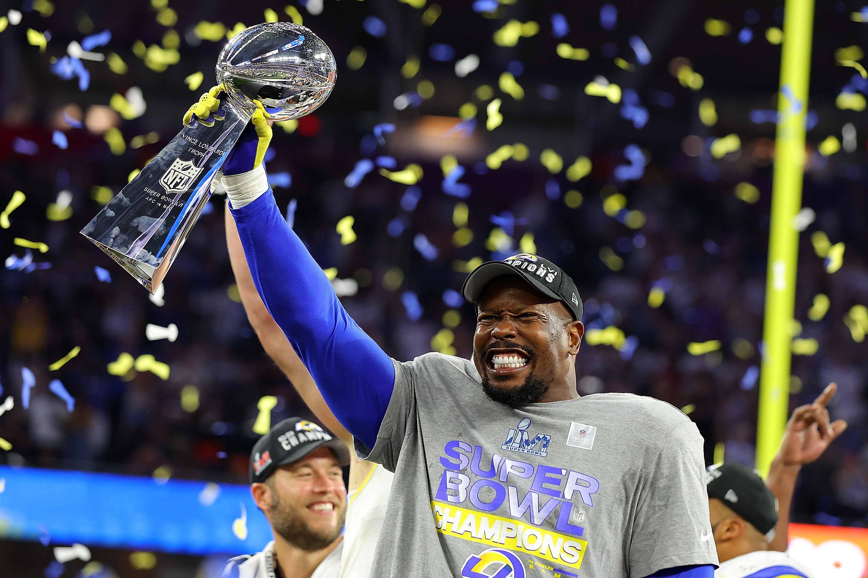 INGLEWOOD, CALIFORNIA - FEBRUARY 13: Von Miller #40 of the Los Angeles Rams holds up the Vince Lombardi Trophy  after Super Bowl LVI at SoFi Stadium on February 13, 2022 in Inglewood, California. The Los Angeles Rams defeated the Cincinnati Bengals 23-20.  (Photo by Kevin C. Cox/Getty Images)