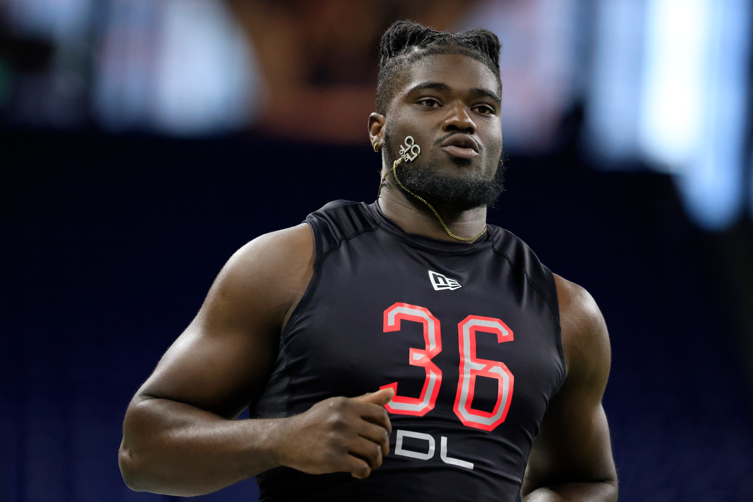 INDIANAPOLIS, INDIANA - MARCH 05: David Ojabo #DL36 of Michigan runs the 40 yard dash during the NFL Combine at Lucas Oil Stadium on March 05, 2022 in Indianapolis, Indiana. (Photo by Justin Casterline/Getty Images) INDIANAPOLIS, INDIANA - MARCH 05: David Ojabo #DL36 of Michigan runs the 40 yard dash during the NFL Combine at Lucas Oil Stadium on March 05, 2022 in Indianapolis, Indiana. (Photo by Justin Casterline/Getty Images)