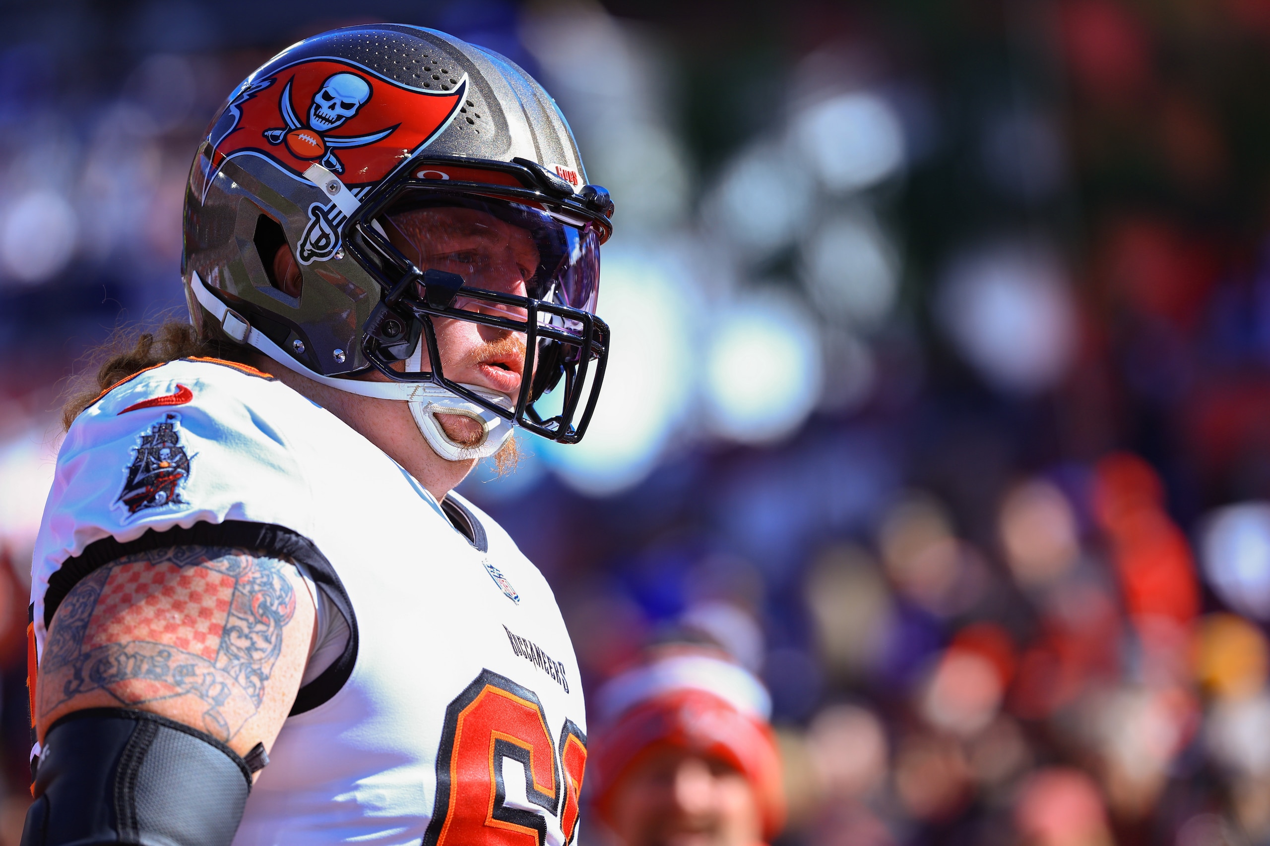 TAMPA, FLORIDA - JANUARY 23: Ryan Jensen #66 of the Tampa Bay Buccaneers warms up before the game against the Los Angeles Rams in the NFC Divisional Playoff game at Raymond James Stadium on January 23, 2022 in Tampa, Florida. (Photo by Mike Ehrmann/Getty Images)