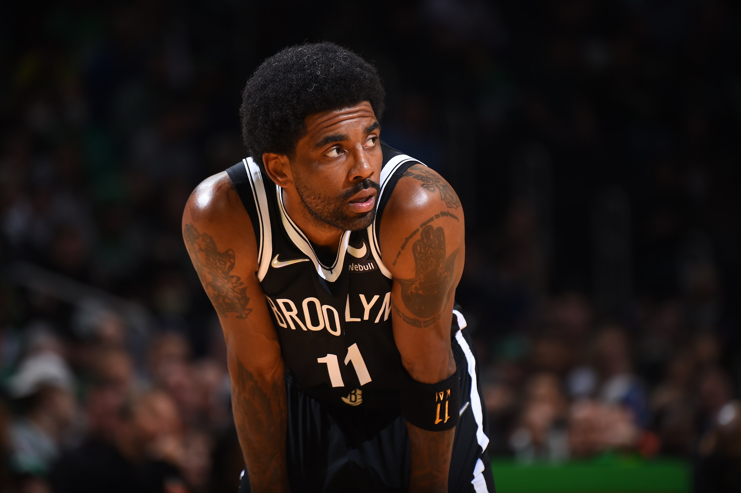 BOSTON, MA - MARCH 6: Kyrie Irving #11 of the Brooklyn Nets looks on during the game against the Boston Celtics on March 6, 2022 at the TD Garden in Boston, Massachusetts.  NOTE TO USER: User expressly acknowledges and agrees that, by downloading and or using this photograph, User is consenting to the terms and conditions of the Getty Images License Agreement. Mandatory Copyright Notice: Copyright 2022 NBAE  (Photo by Brian Babineau/NBAE via Getty Images)