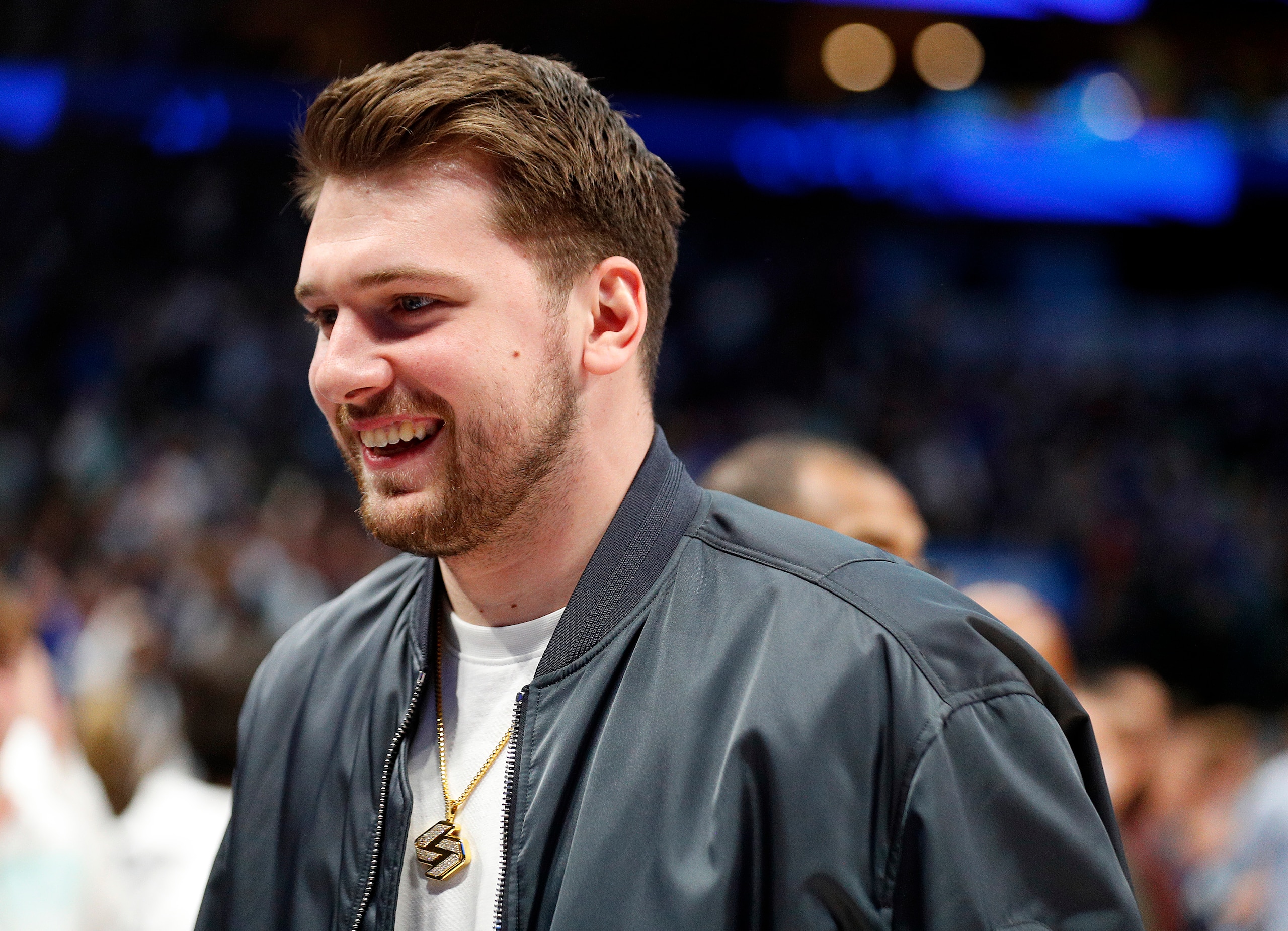 DALLAS, TEXAS - MARCH 05: Luka Doncic of the Dallas Mavericks smiles as he walks off the court after the win over the Sacramento Kings at American Airlines Center on March 05, 2022 in Dallas, Texas. NOTE TO USER: User expressly acknowledges and agrees that, by downloading and or using this photograph, User is consenting to the terms and conditions of the Getty Images License Agreement.  (Photo by Richard Rodriguez/Getty Images)