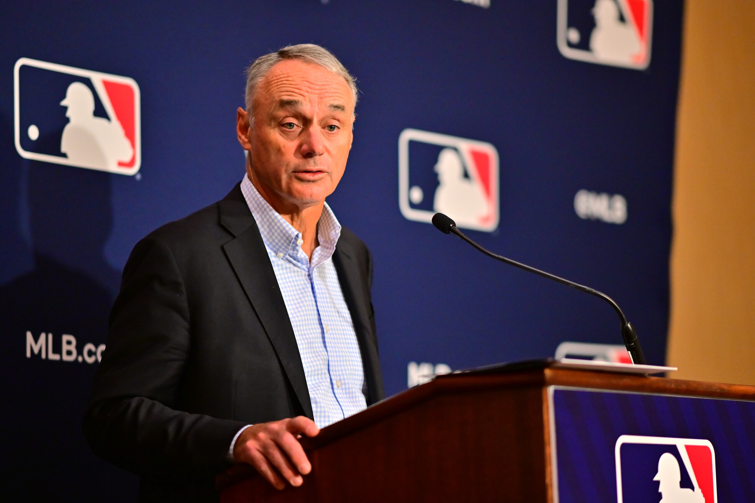ORLANDO, FLORIDA - FEBRUARY 10: Major League Baseball Commissioner Rob Manfred answers questions during an MLB owner's meeting at the Waldorf Astoria on February 10, 2022 in Orlando, Florida. Manfred addressed the ongoing lockout of players, which owners put in place after the league's collective bargaining agreement ended on December 1, 2021. (Photo by Julio Aguilar/Getty Images) ORLANDO, FLORIDA - FEBRUARY 10: Major League Baseball Commissioner Rob Manfred answers questions during an MLB owner's meeting at the Waldorf Astoria on February 10, 2022 in Orlando, Florida. Manfred addressed the ongoing lockout of players, which owners put in place after the league's collective bargaining agreement ended on December 1, 2021. (Photo by Julio Aguilar/Getty Images)