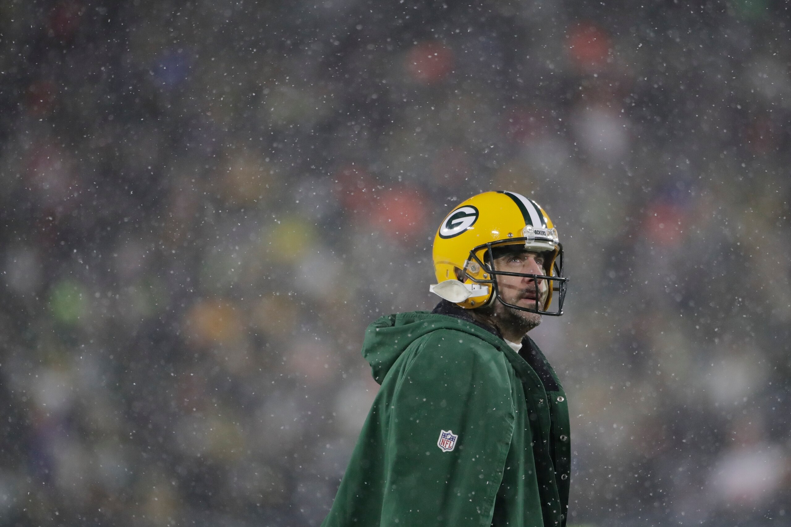 Green Bay Packers' Aaron Rodgers looks up during the second half of an NFC divisional playoff NFL football game against the San Francisco 49ers Saturday, Jan. 22, 2022, in Green Bay, Wis. (AP Photo/Aaron Gash)