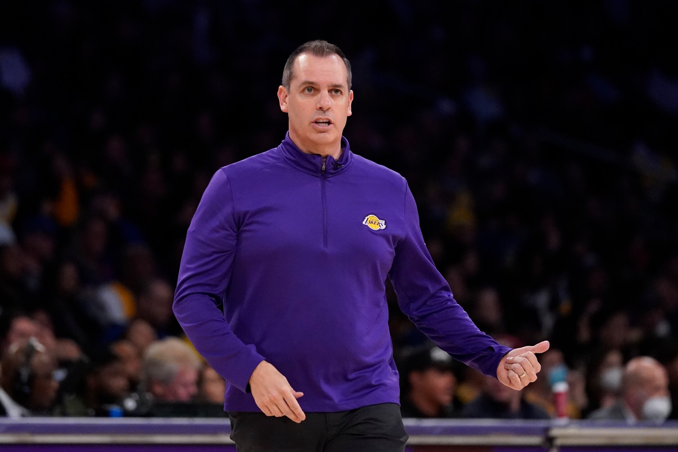 Los Angeles Lakers head coach Frank Vogel stands on the sideline during the first half of an NBA basketball game against the Golden State Warriors in Los Angeles, Saturday, March 5, 2022. (AP Photo/Ashley Landis)