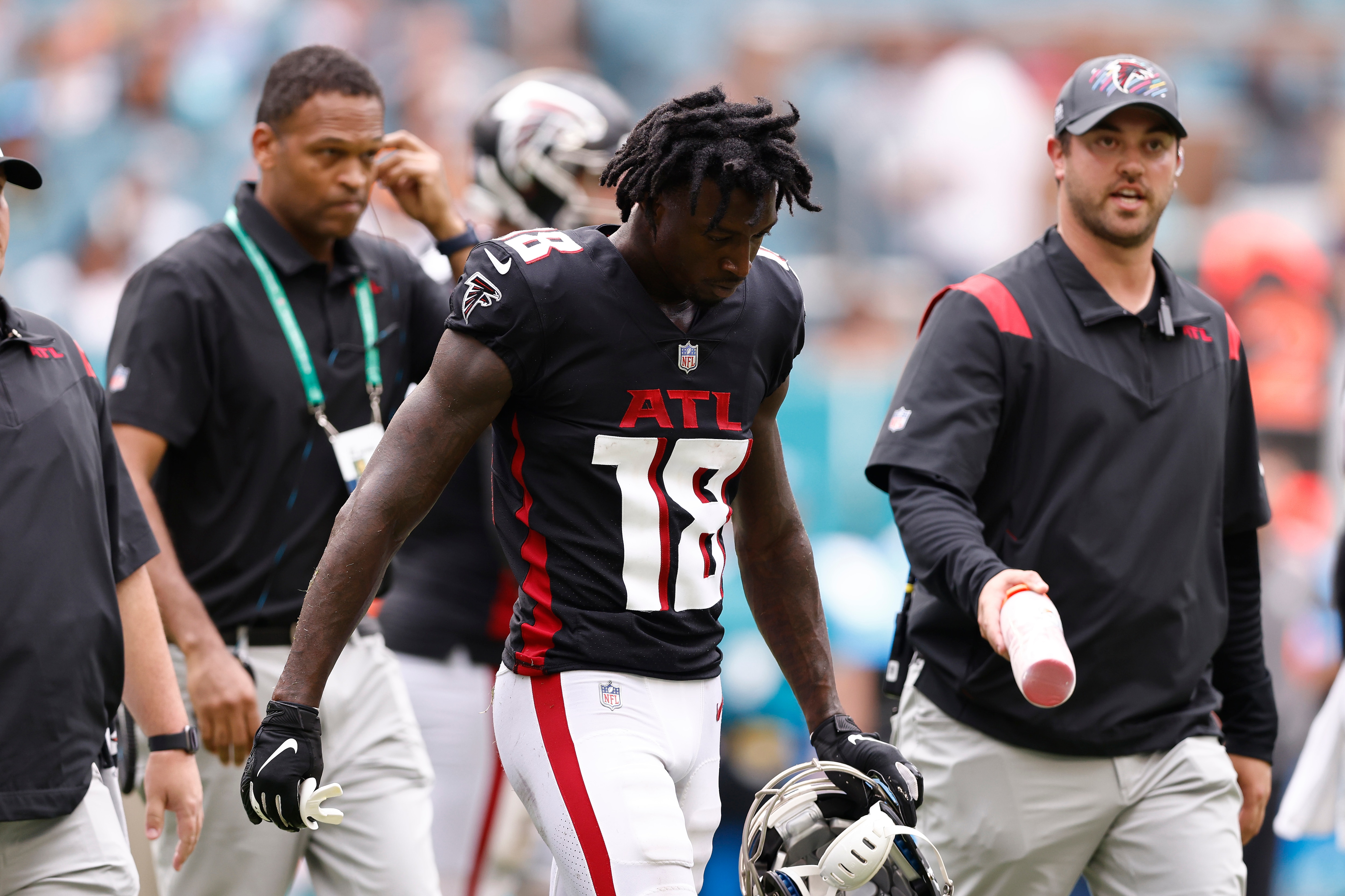MIAMI GARDENS, FLORIDA - OCTOBER 24: Calvin Ridley #18 of the Atlanta Falcons reacts after being injured against the Miami Dolphins during the third quarter at Hard Rock Stadium on October 24, 2021 in Miami Gardens, Florida. (Photo by Michael Reaves/Getty Images)