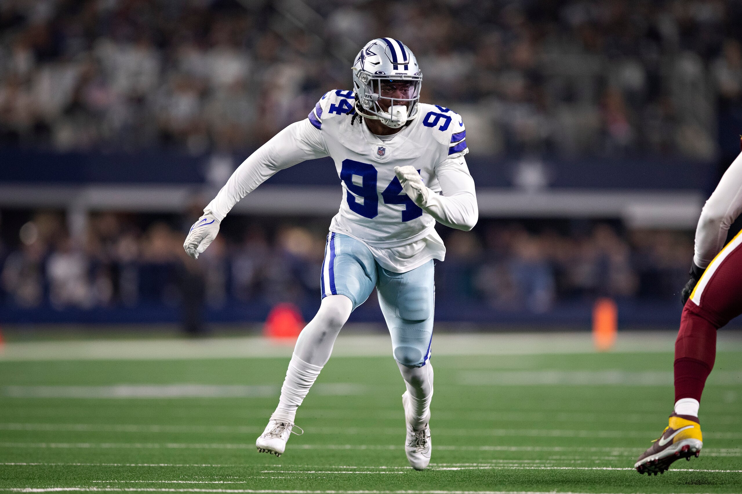 ARLINGTON, TEXAS - DECEMBER 26:  Randy Gregory #94 of the Dallas Cowboys rushes the quarterback during a game against the Washington Football Team at AT&T Stadium on December 26, 2021 in Arlington, Texas.  The Cowboys defeated the Football Team 56-14.  (Photo by Wesley Hitt/Getty Images)