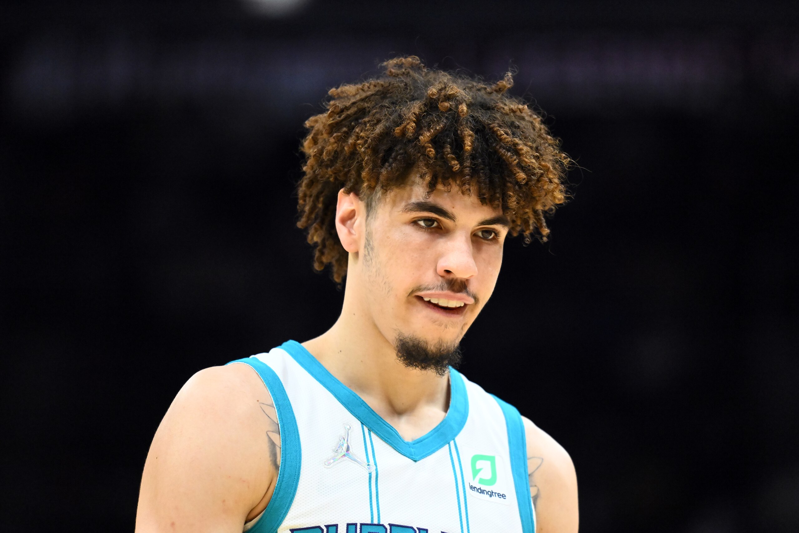 CLEVELAND, OHIO - MARCH 02: LaMelo Ball #2 of the Charlotte Hornets walks back to the bench during the third quarter against the Cleveland Cavaliers at Rocket Mortgage Fieldhouse on March 02, 2022 in Cleveland, Ohio. The Hornets defeated the Cavaliers 119-98. NOTE TO USER: User expressly acknowledges and agrees that, by downloading and/or using this photograph, user is consenting to the terms and conditions of the Getty Images License Agreement. (Photo by Jason Miller/Getty Images)