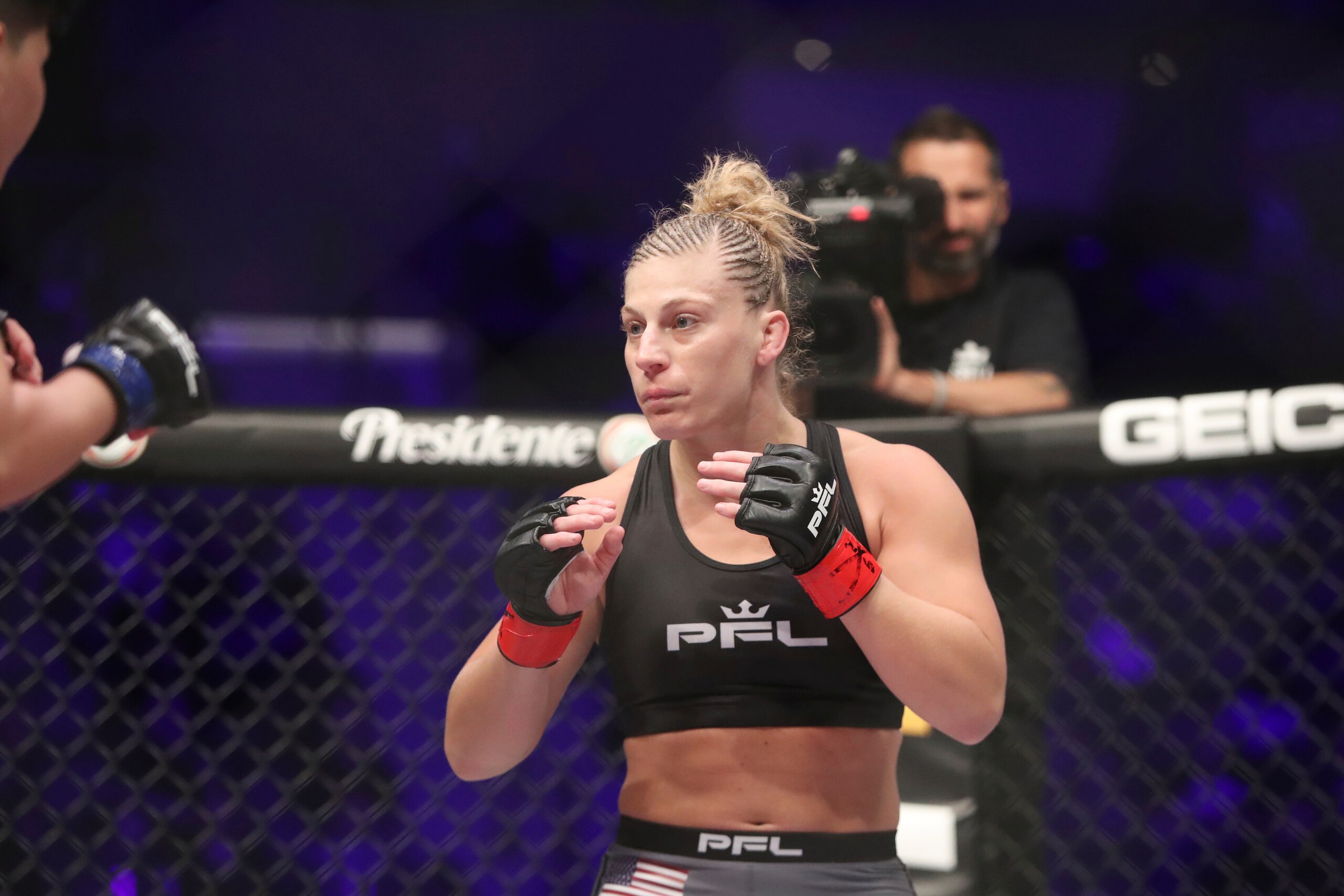 Kayla Harrison, right, in action against Larissa Pacheco during their regular season mixed martial arts bout at PFL 1, Thursday, May 9, 2019, at the Nassau Coliseum (NYCB Live) in Uniondale, NY. Harrison won via unanimous decision. (AP Photo/Gregory Payan)