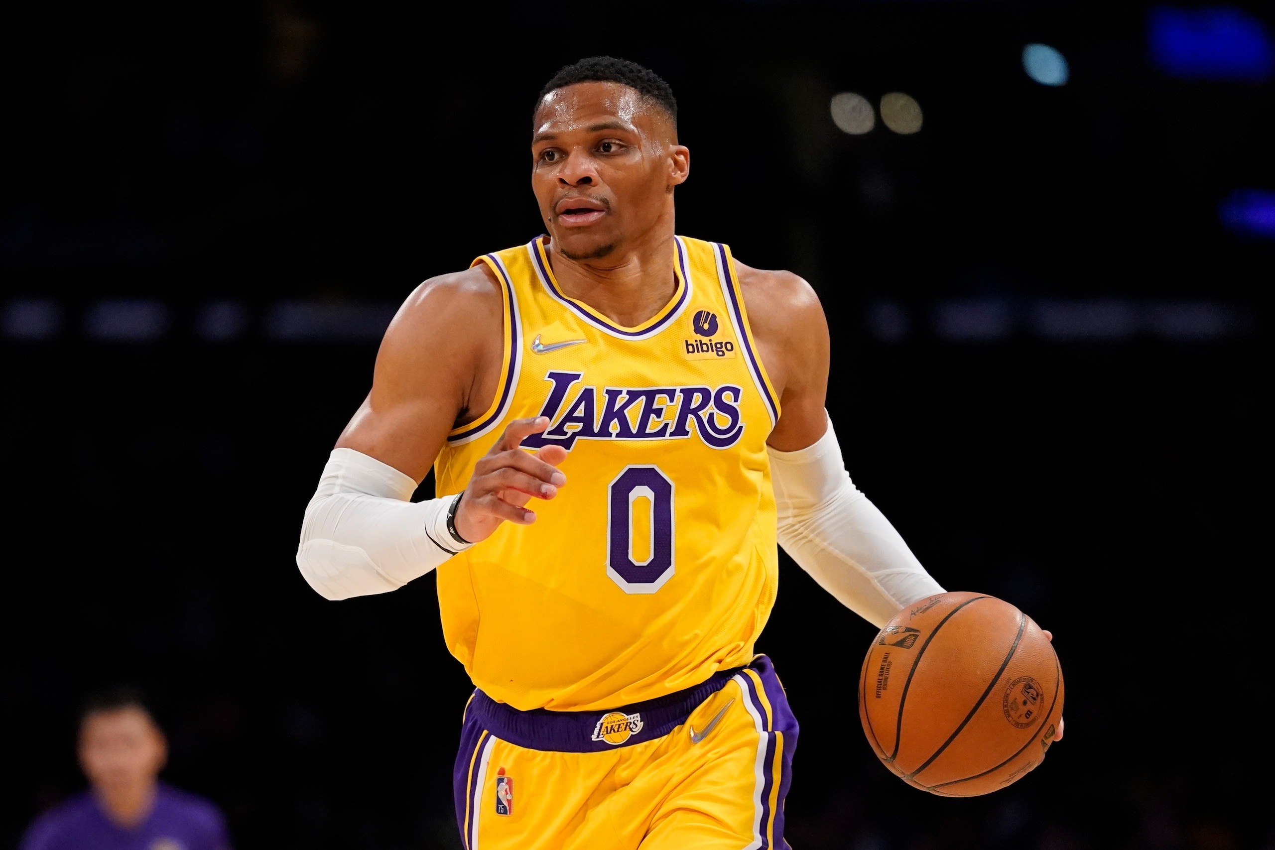 Los Angeles Lakers guard Russell Westbrook (0) controls the ball during the first half of an NBA basketball game against the Golden State Warriors in Los Angeles, Saturday, March 5, 2022. (AP Photo/Ashley Landis) Los Angeles Lakers guard Russell Westbrook (0) controls the ball during the first half of an NBA basketball game against the Golden State Warriors in Los Angeles, Saturday, March 5, 2022. (AP Photo/Ashley Landis)