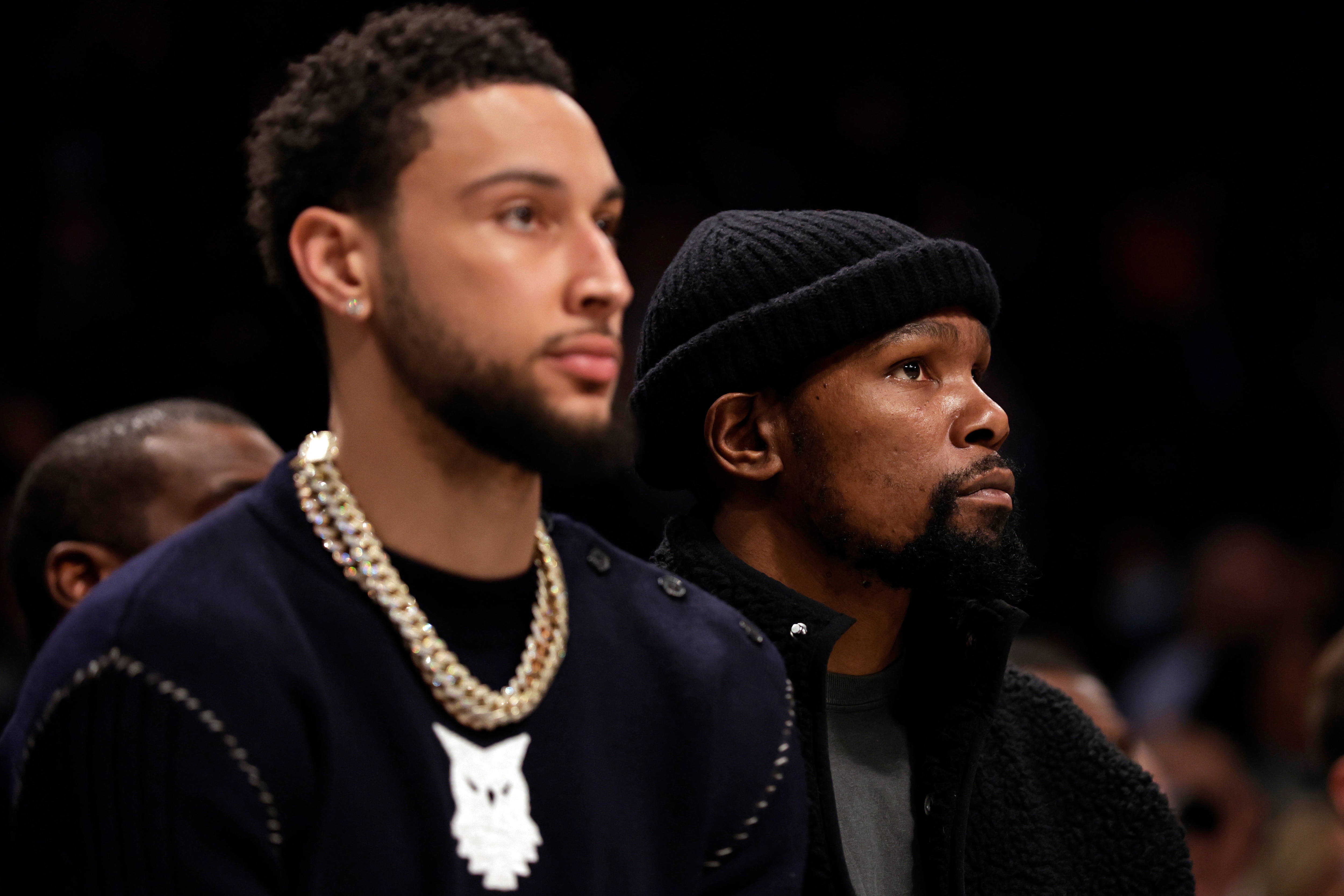 NEW YORK, NEW YORK - FEBRUARY 24: Kevin Durant #7 of the Brooklyn Nets looks on from the bench next to Ben Simmons #10 of the Brooklyn Nets against the Boston Celtics during the first half at Barclays Center on February 24, 2022 in New York City. NOTE TO USER: User expressly acknowledges and agrees that, by downloading and or using this Photograph, user is consenting to the terms and conditions of the Getty Images License Agreement. (Photo by Adam Hunger/Getty Images)
