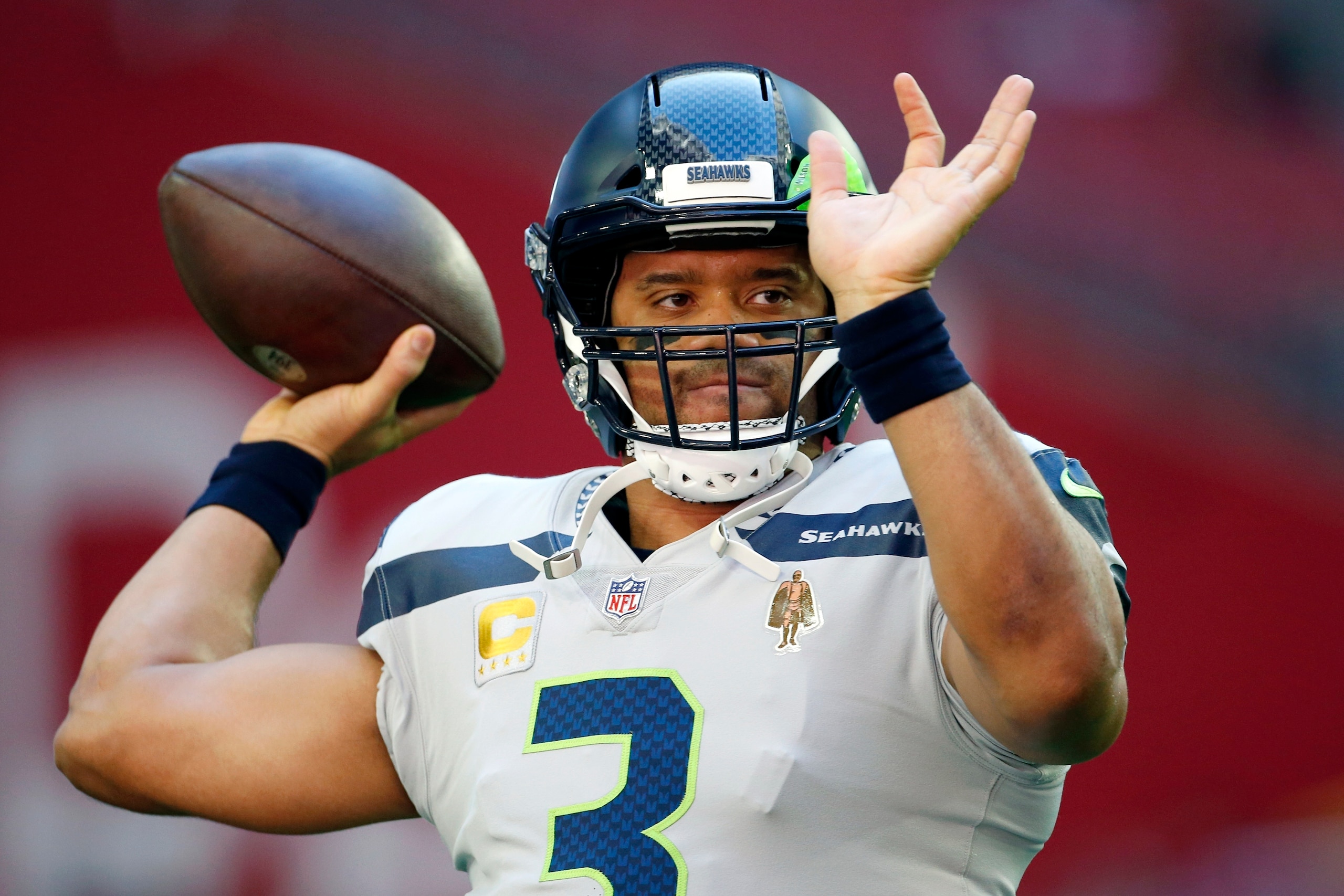 FILE - Seattle Seahawks quarterback Russell Wilson warms up prior to an NFL football game against the Arizona Cardinals in Jan. 9, 2022, in Glendale, Ariz. Tension between Wilson and the Seahawks surfaced last offseason. Now the issue is what's best for the club's future, although the Seahawks keep saying they're not shopping the Super Bowl 48 winner. (AP Photo/Ralph Freso, File) FILE - Seattle Seahawks quarterback Russell Wilson warms up prior to an NFL football game against the Arizona Cardinals in Jan. 9, 2022, in Glendale, Ariz. Tension between Wilson and the Seahawks surfaced last offseason. Now the issue is what's best for the club's future, although the Seahawks keep saying they're not shopping the Super Bowl 48 winner. (AP Photo/Ralph Freso, File)