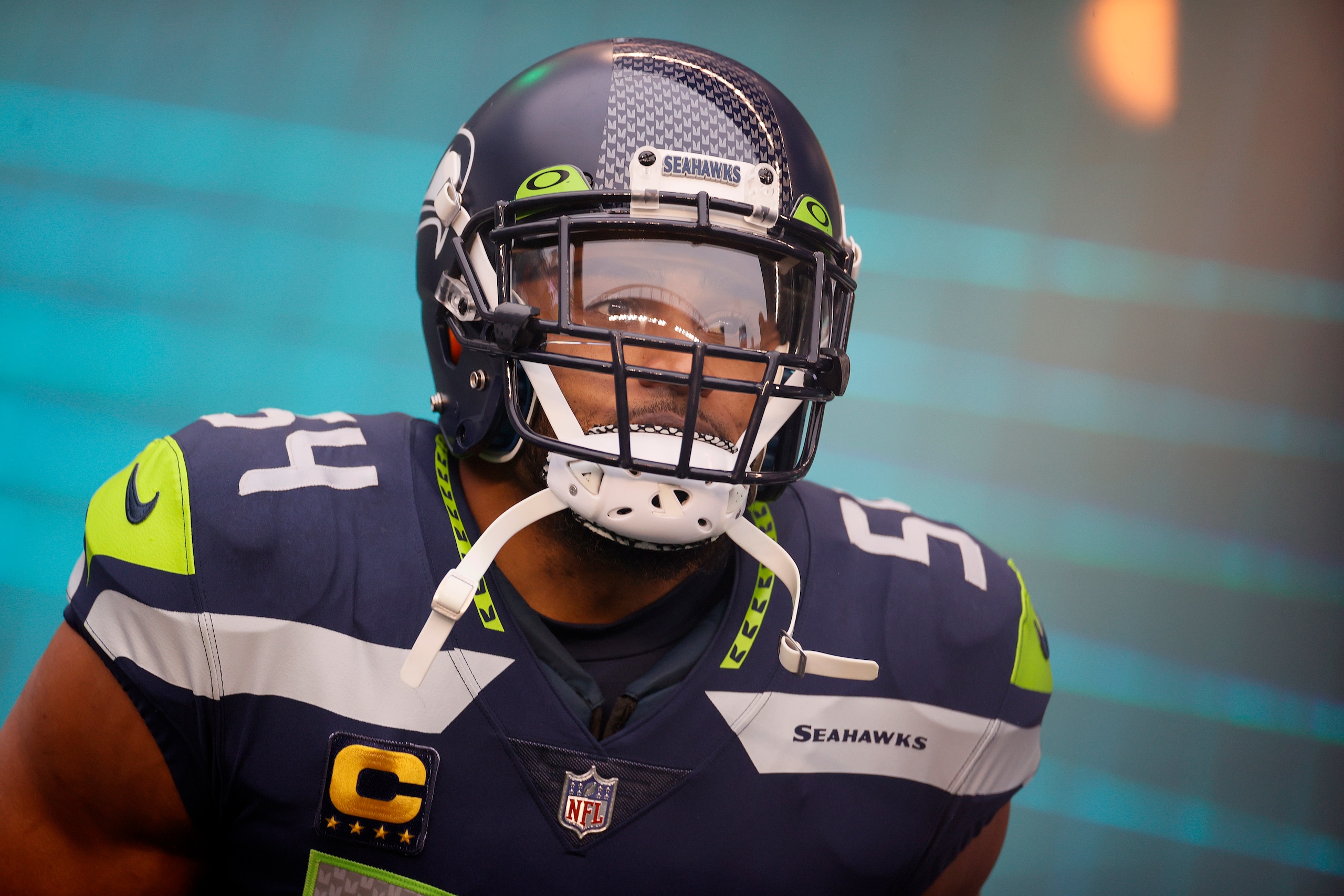 SEATTLE, WASHINGTON - JANUARY 02: Bobby Wagner #54 of the Seattle Seahawks runs onto the field during player introductions before the game against the Detroit Lions at Lumen Field on January 02, 2022 in Seattle, Washington. (Photo by Steph Chambers/Getty Images)