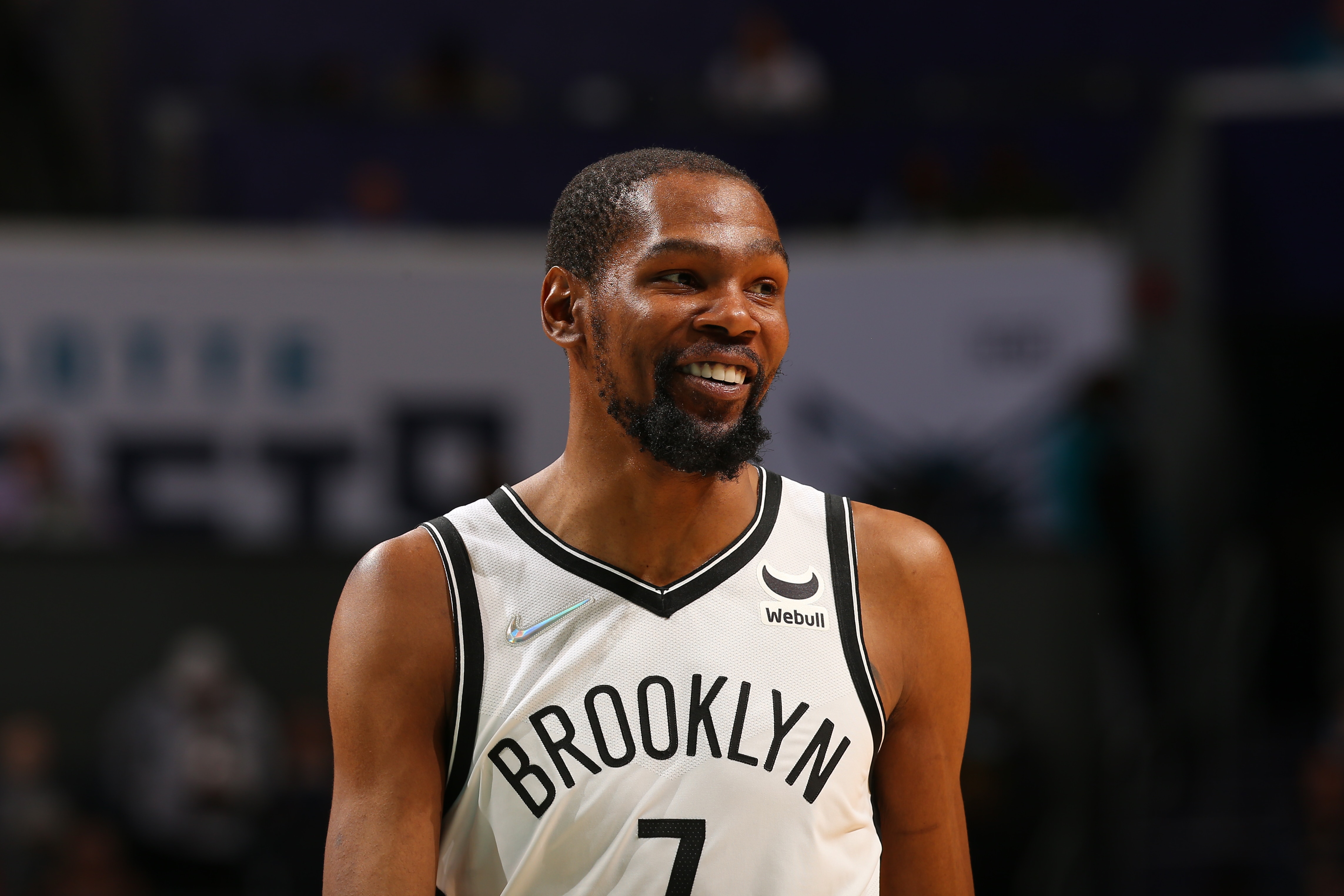 CHARLOTTE, NC - MARCH 8: Kevin Durant #7 of the Brooklyn Nets smiles during the game against the Charlotte Hornets on March 8, 2022 at Spectrum Center in Charlotte, North Carolina. NOTE TO USER: User expressly acknowledges and agrees that, by downloading and or using this photograph, User is consenting to the terms and conditions of the Getty Images License Agreement. Mandatory Copyright Notice: Copyright 2022 NBAE (Photo by Kent Smith/NBAE via Getty Images)