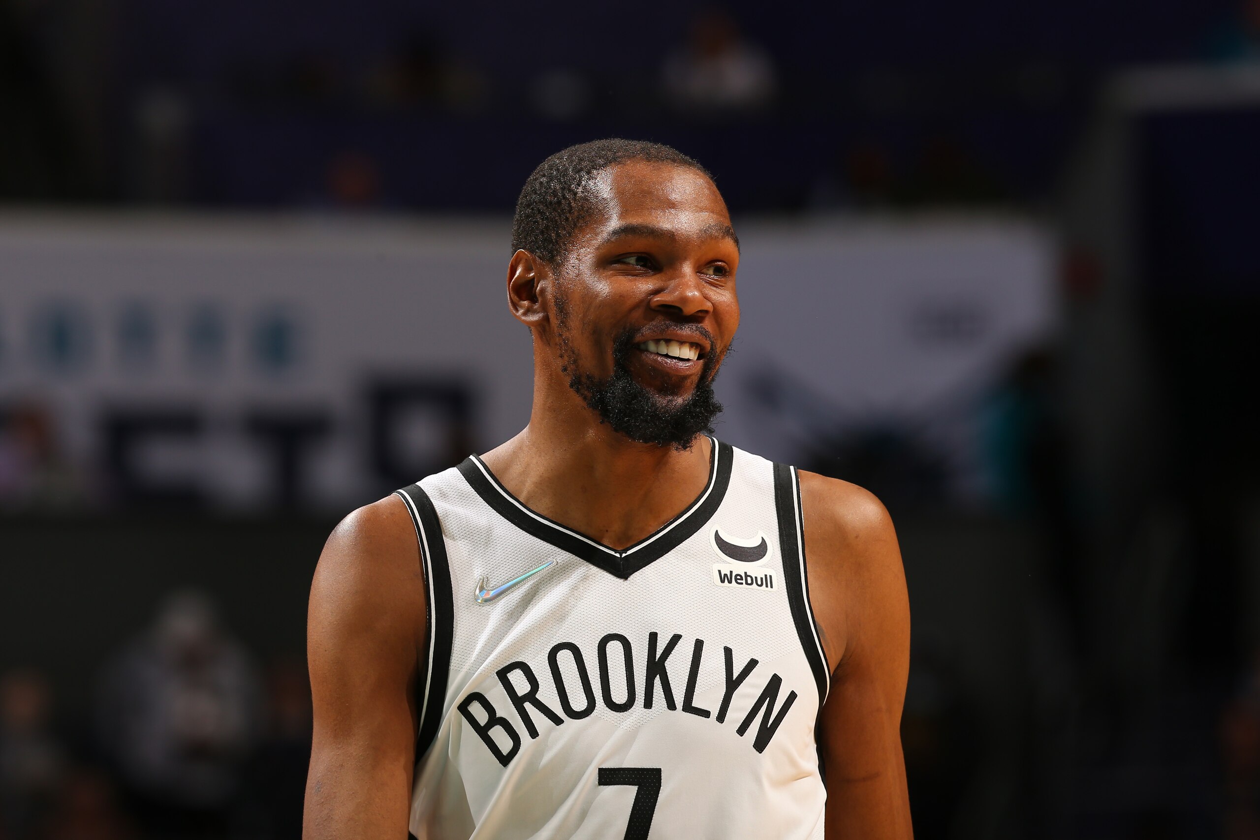 CHARLOTTE, NC - MARCH 8: Kevin Durant #7 of the Brooklyn Nets smiles during the game against the Charlotte Hornets on March 8, 2022 at Spectrum Center in Charlotte, North Carolina. NOTE TO USER: User expressly acknowledges and agrees that, by downloading and or using this photograph, User is consenting to the terms and conditions of the Getty Images License Agreement. Mandatory Copyright Notice: Copyright 2022 NBAE (Photo by Kent Smith/NBAE via Getty Images)