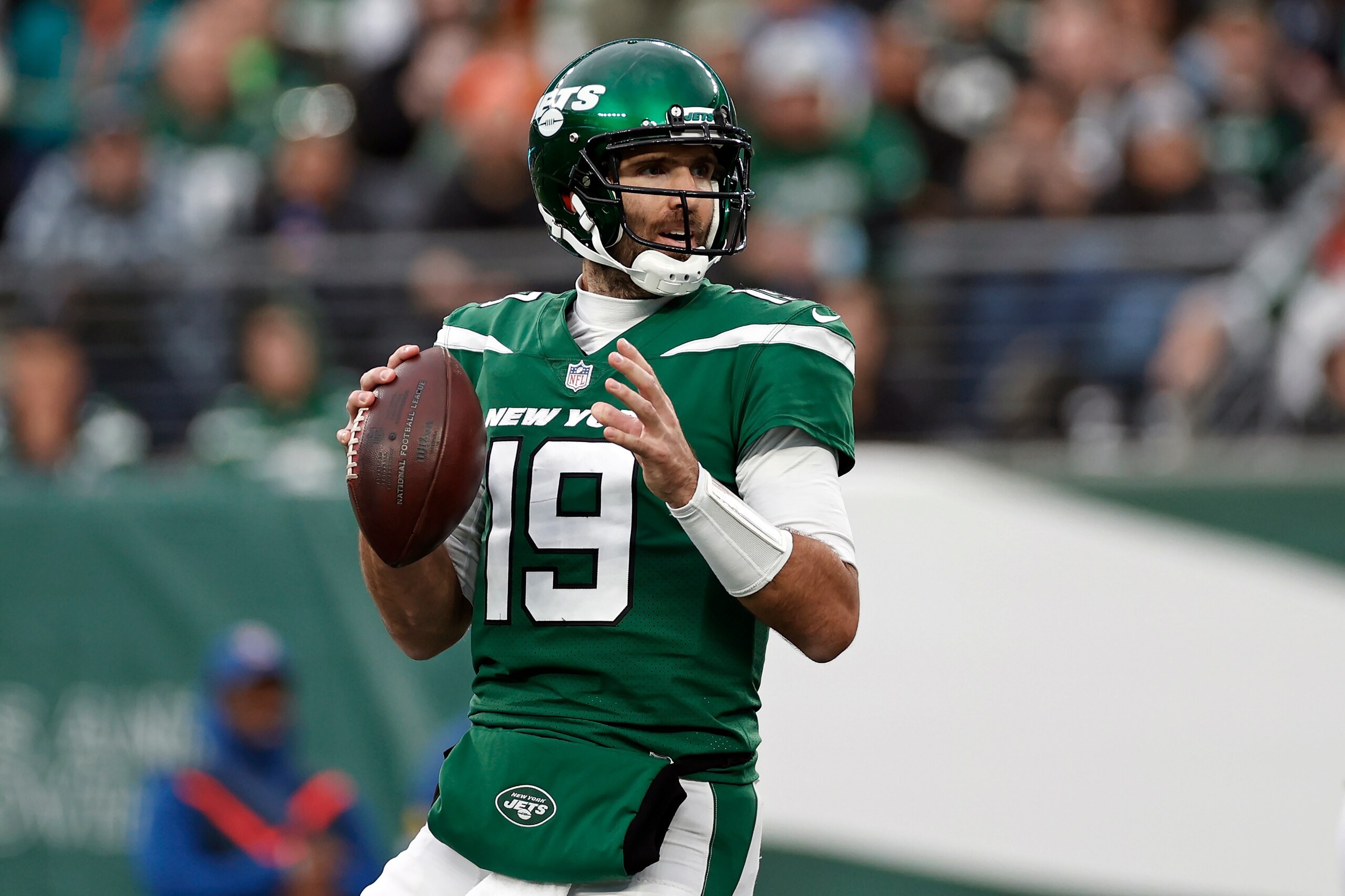 New York Jets quarterback Joe Flacco (19) passes against the Miami Dolphins during an NFL football game, Sunday, Nov. 21, 2021, in East Rutherford, N.J. (AP Photo/Adam Hunger)
