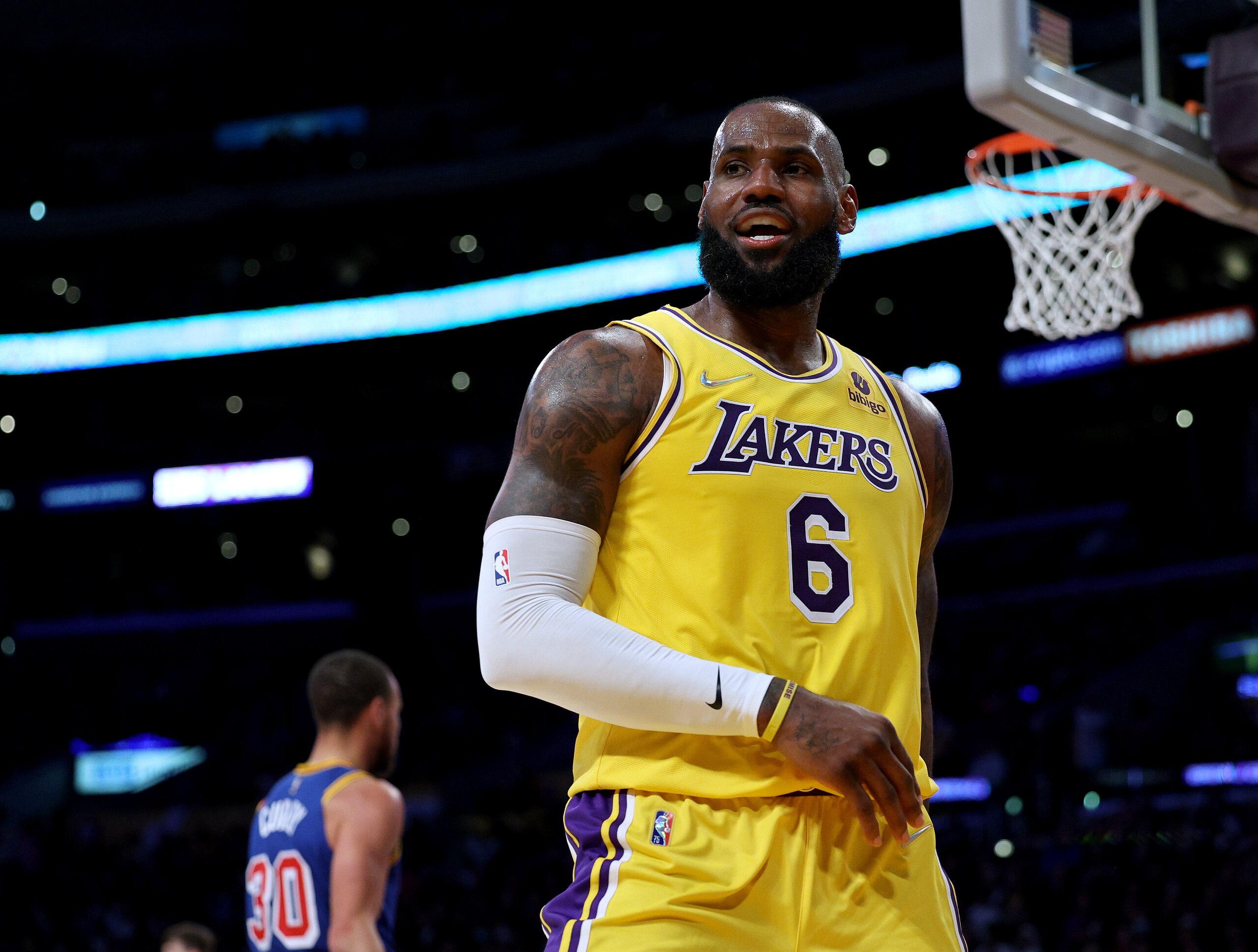 LOS ANGELES, CALIFORNIA - MARCH 05: LeBron James #6 of the Los Angeles Lakers reacts after his basket and Golden State Warriors foul during a 124-116 Lakers win at Crypto.com Arena on March 05, 2022 in Los Angeles, California. NOTE TO USER: User expressly acknowledges and agrees that, by downloading and/or using this Photograph, user is consenting to the terms and conditions of the Getty Images License Agreement. Mandatory Copyright Notice: Copyright 2022 NBAE (Photo by Harry How/Getty Images)