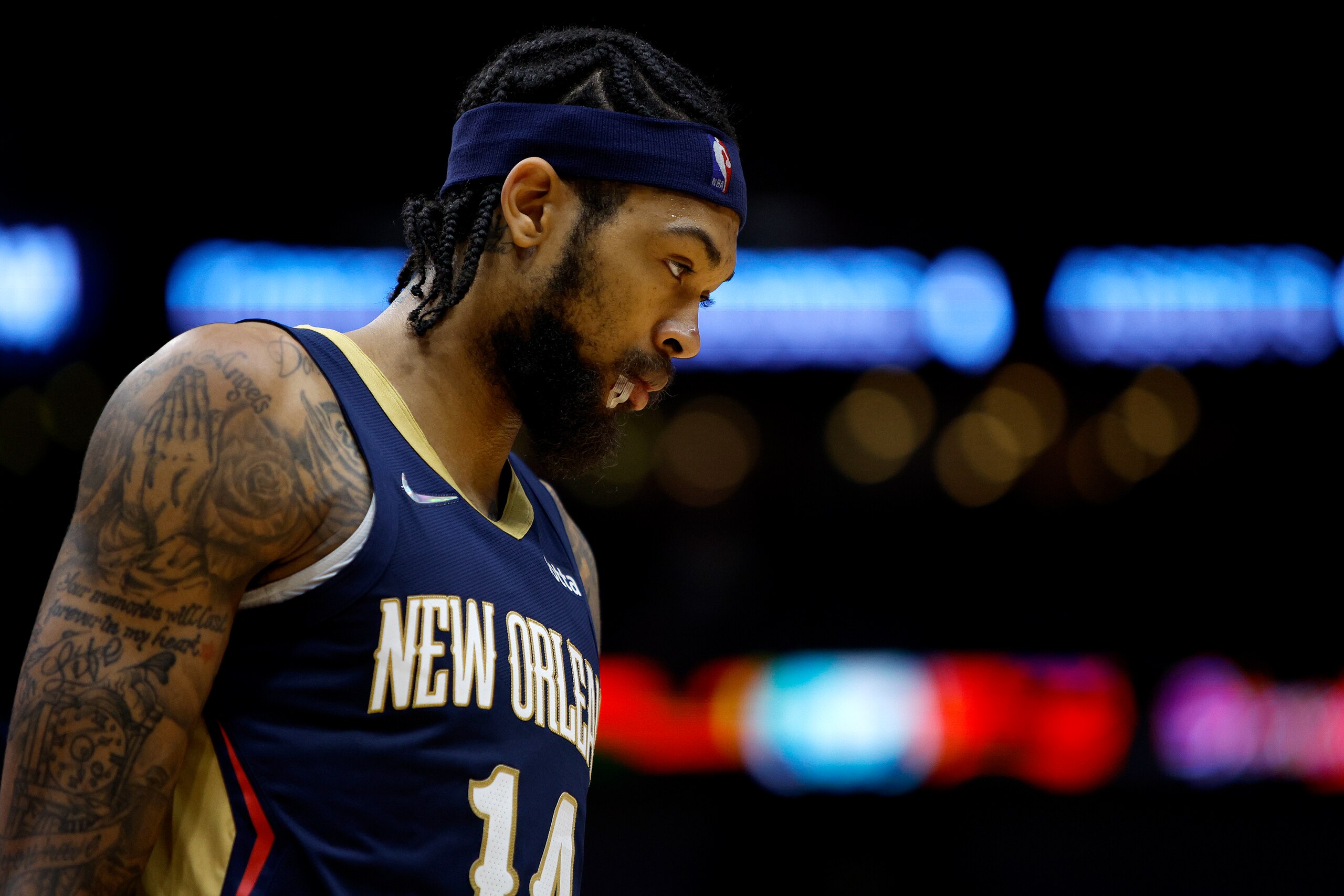 NEW ORLEANS, LOUISIANA - MARCH 02: Brandon Ingram #14 of the New Orleans Pelicans stands on the court after sustaining an injury to his mouth during the fourth quarter of an NBA game against the Sacramento Kings at Smoothie King Center on March 02, 2022 in New Orleans, Louisiana. NOTE TO USER: User expressly acknowledges and agrees that, by downloading and or using this photograph, User is consenting to the terms and conditions of the Getty Images License Agreement. (Photo by Sean Gardner/Getty Images)