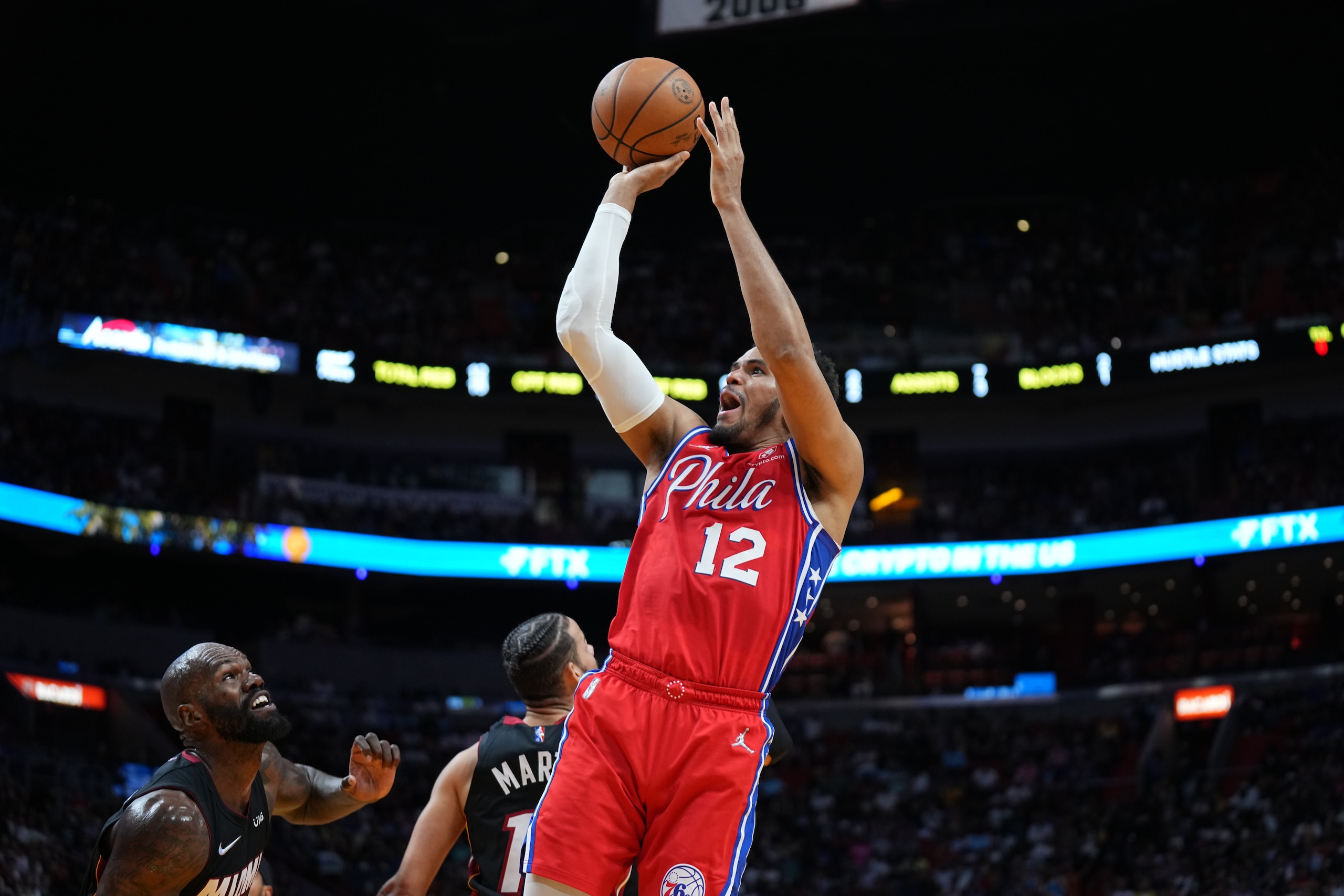 MIAMI, FL - MARCH 5: Tobias Harris #12 of the Philadelphia 76ers shoots the ball during the game against the Miami Heat on March 5, 2022 at FTX Arena in Miami, Florida. NOTE TO USER: User expressly acknowledges and agrees that, by downloading and or using this Photograph, user is consenting to the terms and conditions of the Getty Images License Agreement. Mandatory Copyright Notice: Copyright 2022 NBAE (Photo by Joseph Guzy/NBAE via Getty Images)
