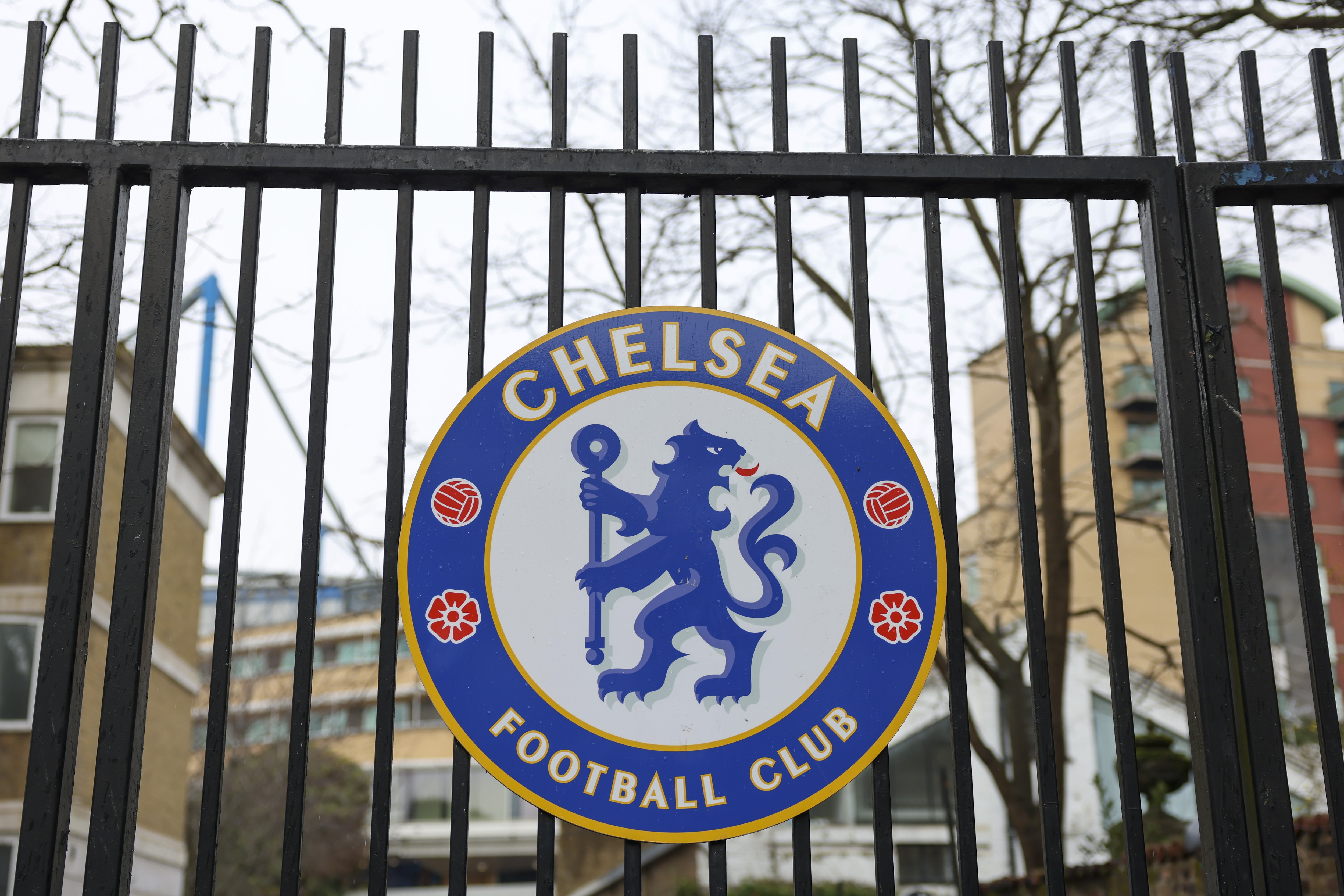 A sign on a gate at Stamford Bridge stadium, the home ground of Chelsea Football Club, owned by Russian billionaire Roman Abramovich, in London, U.K., on Wednesday, March, 2, 2022. Abramovich is selling his London properties, according to British MP Chris Bryant, and a Swiss billionaire said hes been approached about buying Chelsea Football Club. Photographer: Hollie Adams/Bloomberg via Getty Images