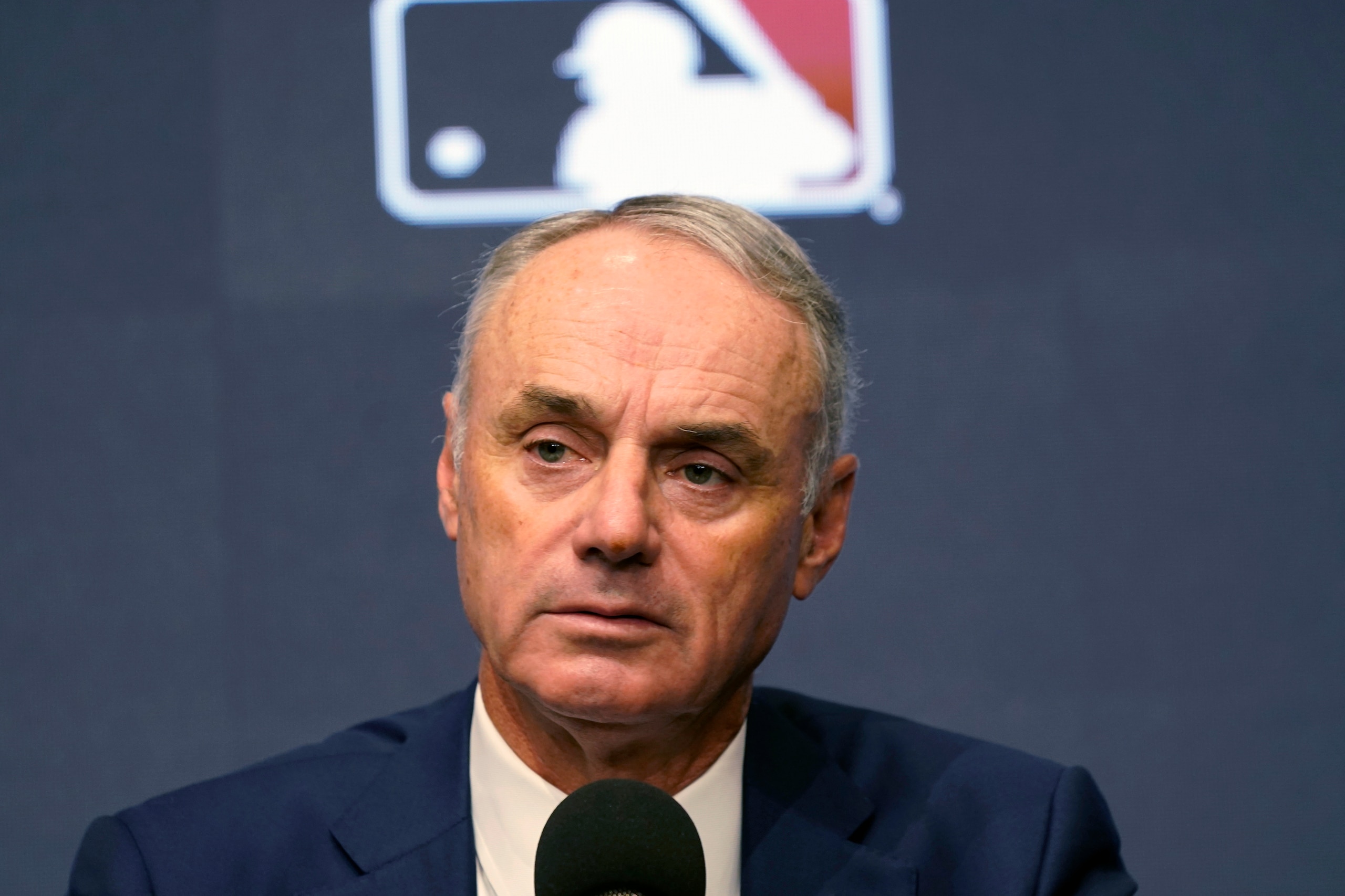 Major League Baseball commissioner Rob Manfred speaks during a news conference in Arlington, Texas, Thursday, Dec. 2, 2021. Owners locked out players at 12:01 a.m. Thursday following the expiration of the sport's five-year collective bargaining agreement. (AP Photo/LM Otero)