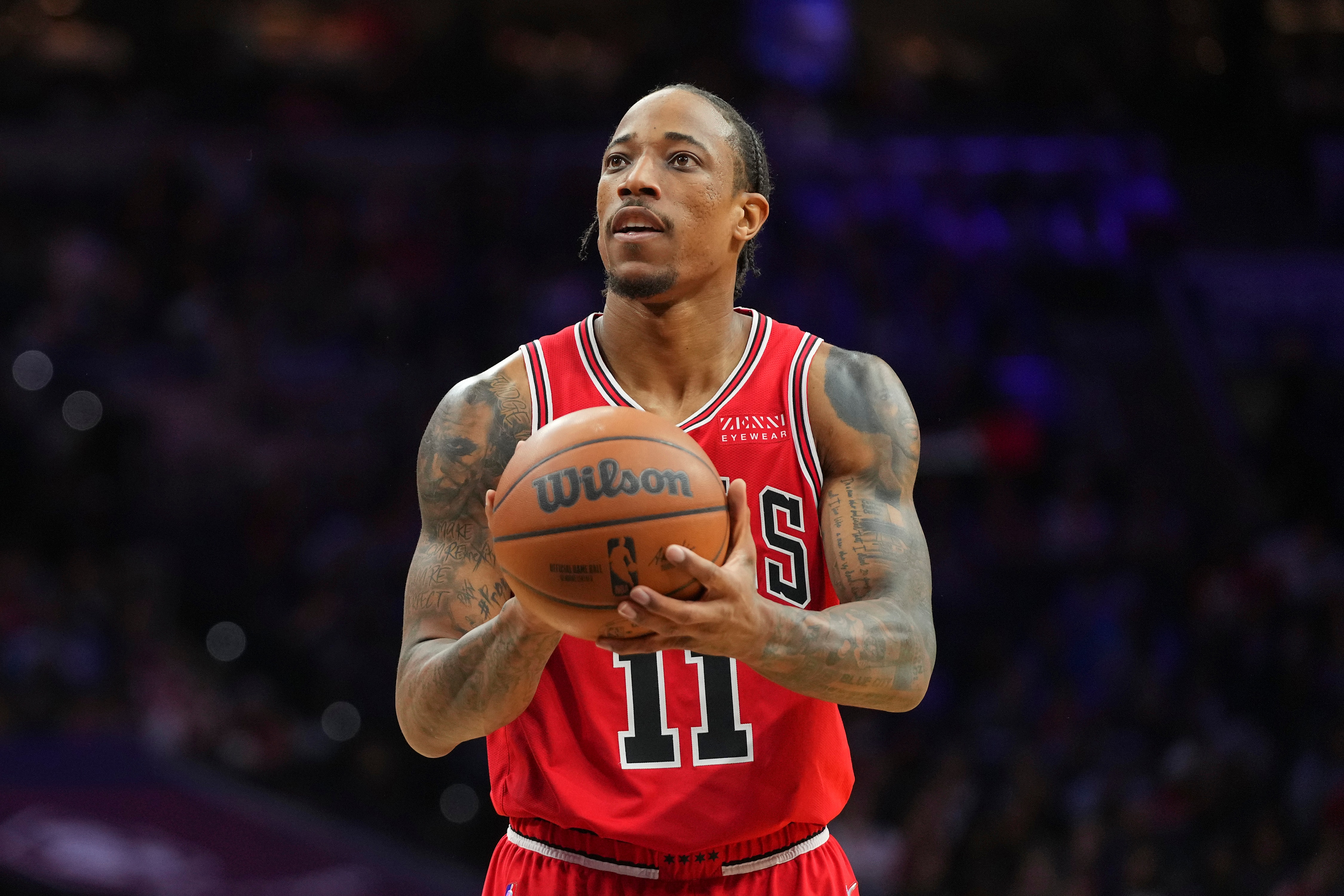 PHILADELPHIA, PA - MARCH 07: DeMar DeRozan #11 of the Chicago Bulls attempts a foul shot against the Philadelphia 76ers at the Wells Fargo Center on March 7, 2022 in Philadelphia, Pennsylvania. The 76ers defeated the Bulls 121-106. NOTE TO USER: User expressly acknowledges and agrees that, by downloading and or using this photograph, User is consenting to the terms and conditions of the Getty Images License Agreement. (Photo by Mitchell Leff/Getty Images)