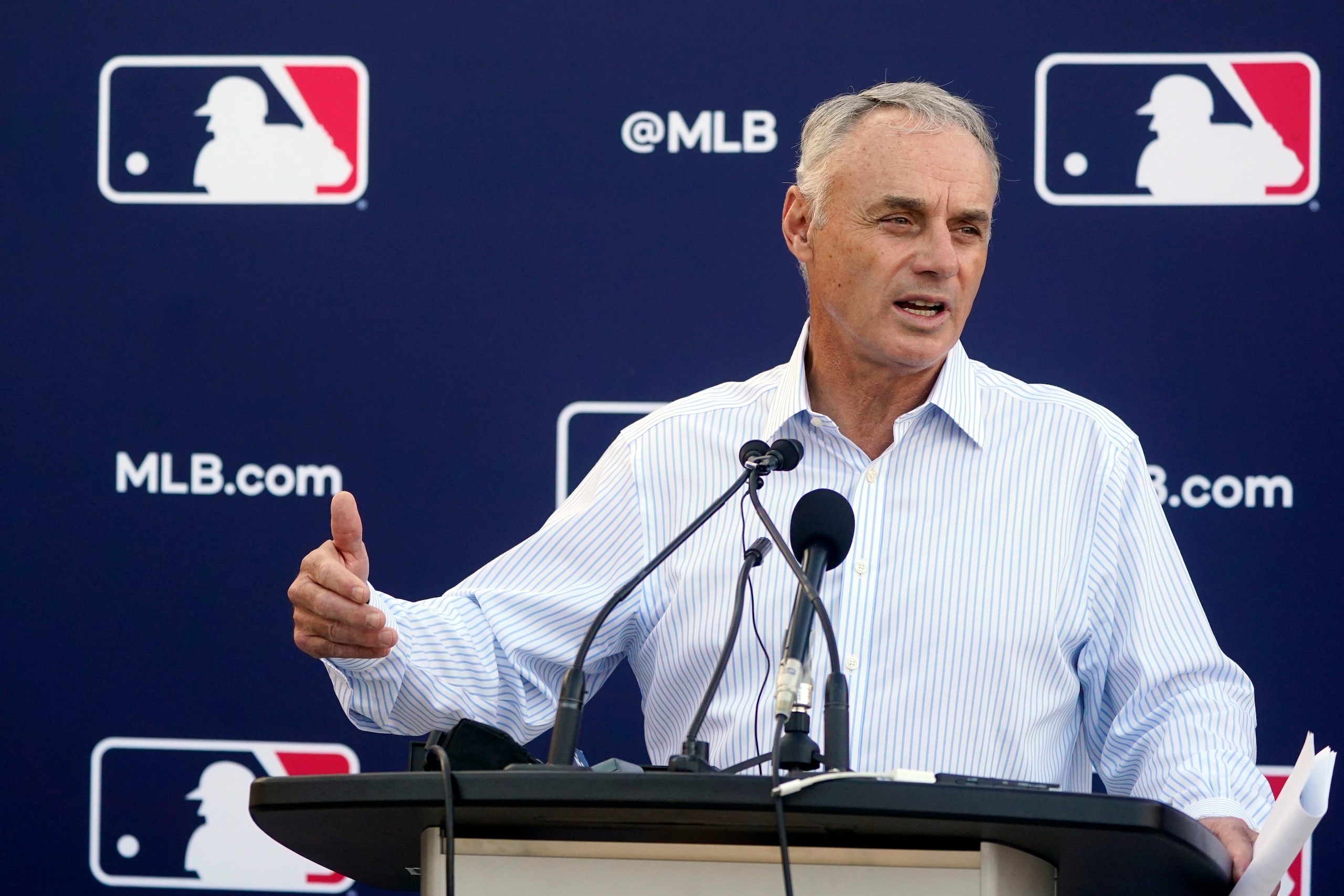 Major League Baseball Commissioner Rob Manfred speaks during a news conference after negotiations with the players' association toward a labor deal, Tuesday, March 1, 2022, at Roger Dean Stadium in Jupiter, Fla. Manfred said he is canceling the first two series of the season that was set to begin March 31, dropping the schedule from 162 games to likely 156 games at most. Manfred said the league and union have not made plans for future negotiations. Players won't be paid for missed games. (AP Photo/Wilfredo Lee)