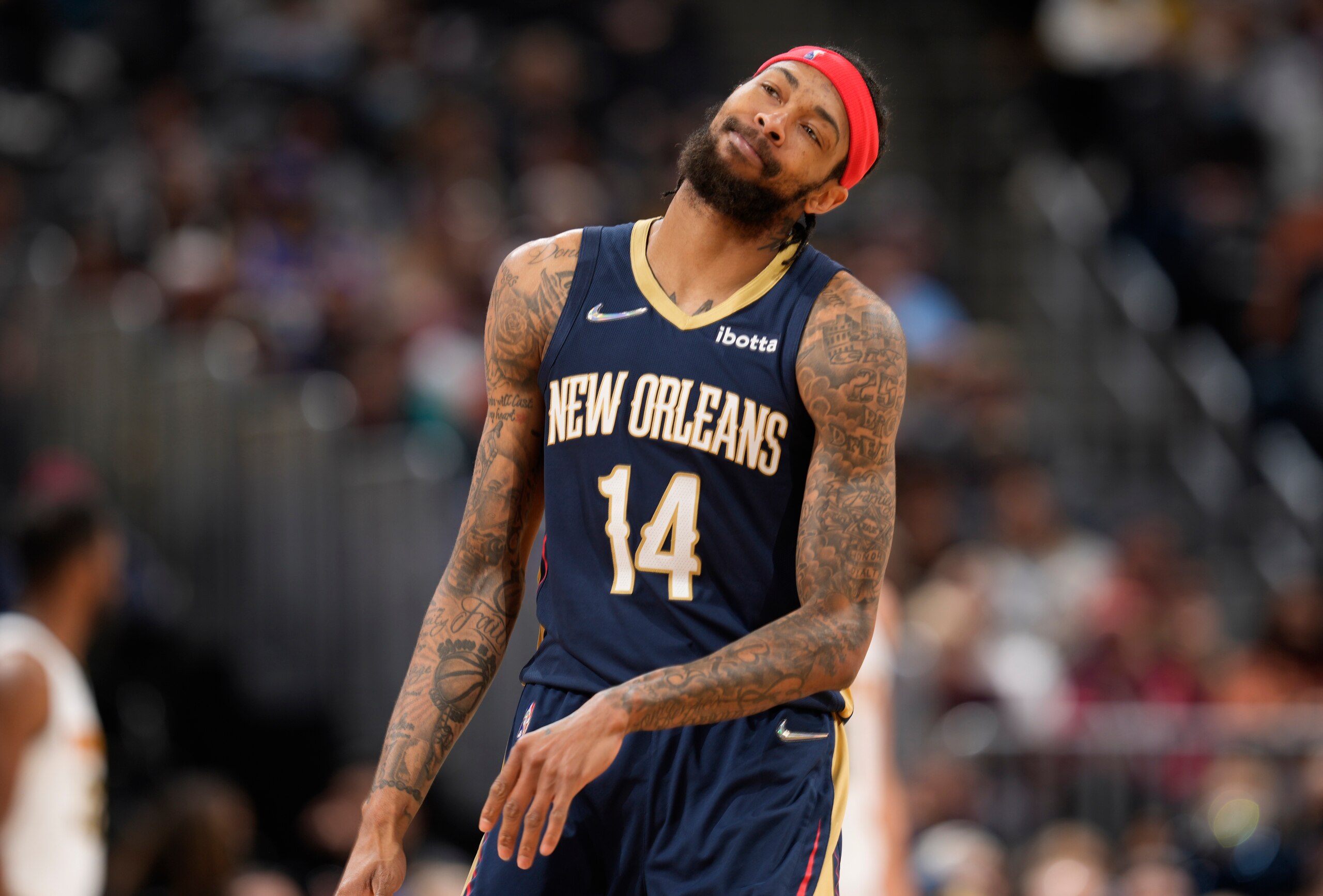 New Orleans Pelicans forward Brandon Ingram reacts in the second half of an NBA basketball game against the Denver Nuggets, Sunday, March 6, 2022, in Denver. (AP Photo/David Zalubowski)